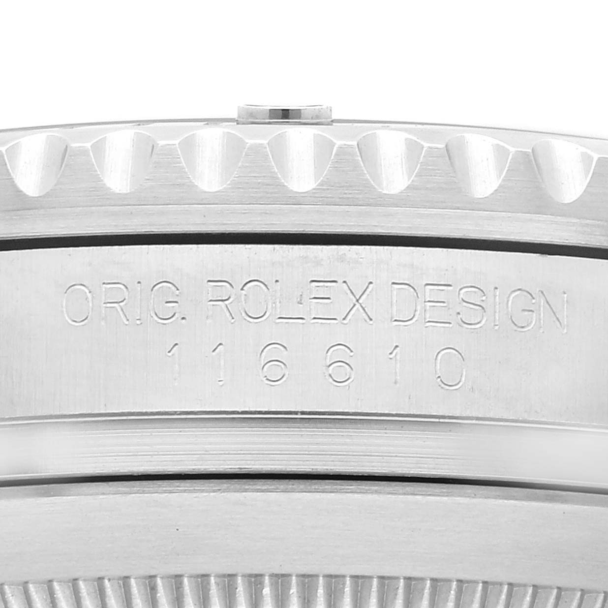 The image shows a close-up of the case side of a Rolex Submariner 116610LV Men
s Stainless Steel Green Dial 116610LV Men
s Stainless Steel Green Dial, highlighting the engravings and the edge of the bezel.