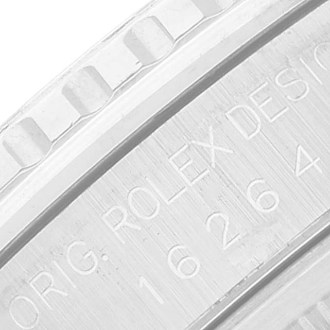 This image shows a close-up of the engraved side of a Rolex Turn-o-Graph 16264 Men
s Stainless Steel Black Dial 16264 Men
s Stainless Steel Black Dial watch.