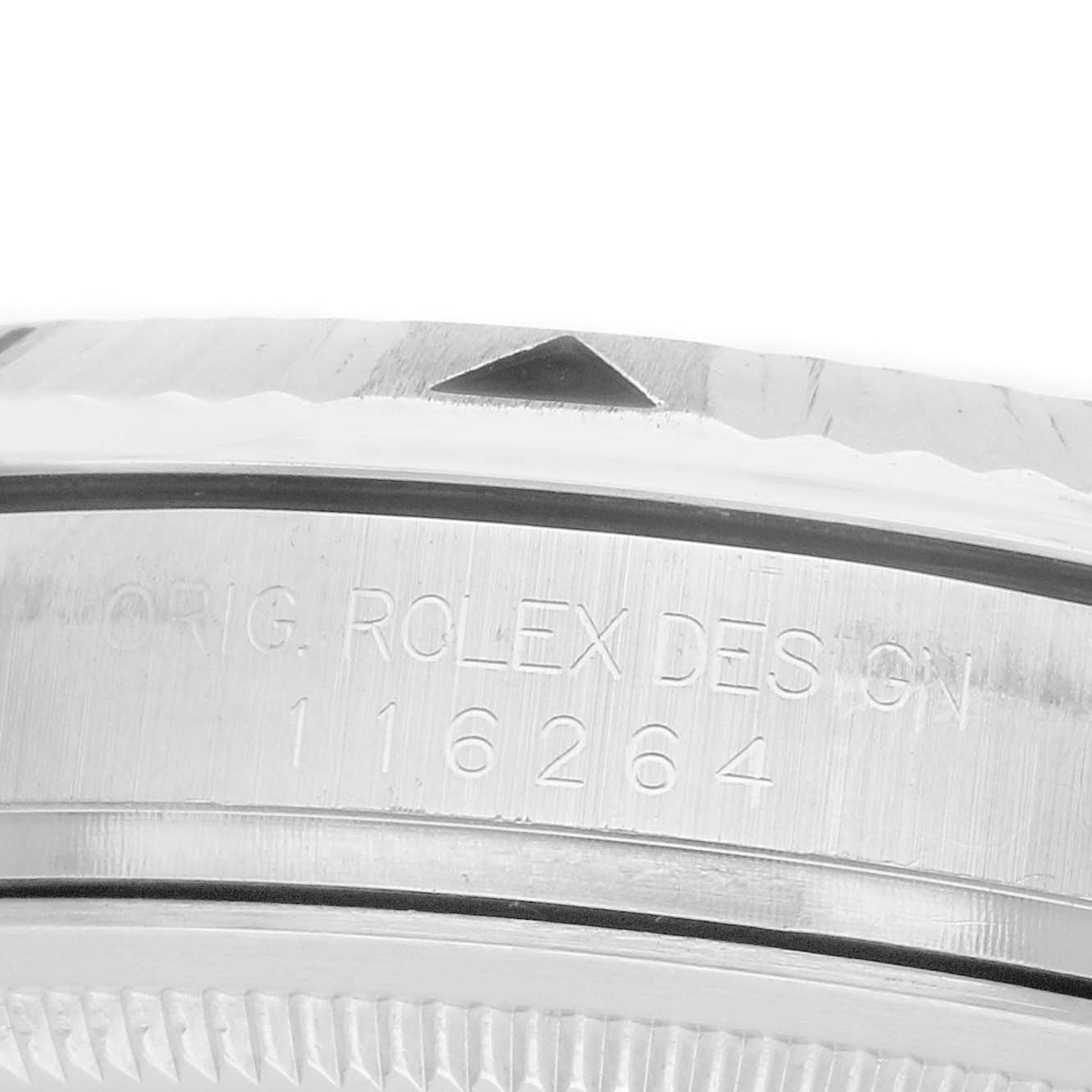 The image shows a close-up of the engraved side of a Rolex Turn-o-Graph 116264 Men
s Stainless Steel White Dial watch case, highlighting the model number.