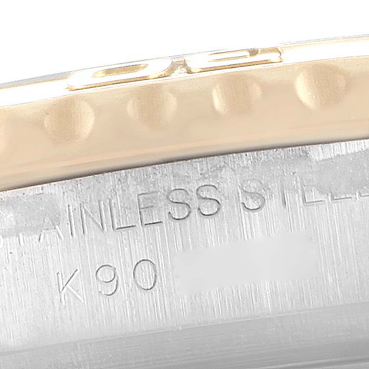 This close-up image shows the stainless steel part of the case and the bezel of a Rolex Yacht-Master 169623 Women's Steel and Gold (two tone) Blue Dial 169623 Women's Steel and Gold (two tone) Blue Dial watch.