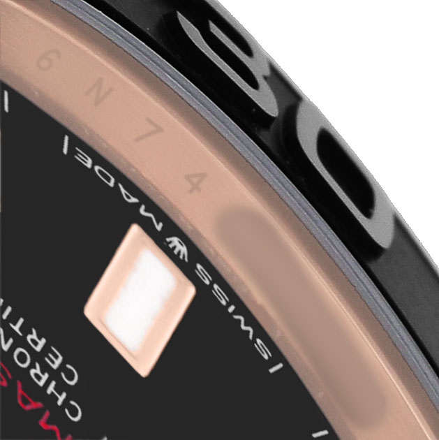 The image shows a close-up angle of the Rolex Yacht-Master 268655 Men's Rose Gold Black Dial's bezel and part of the dial with text details.