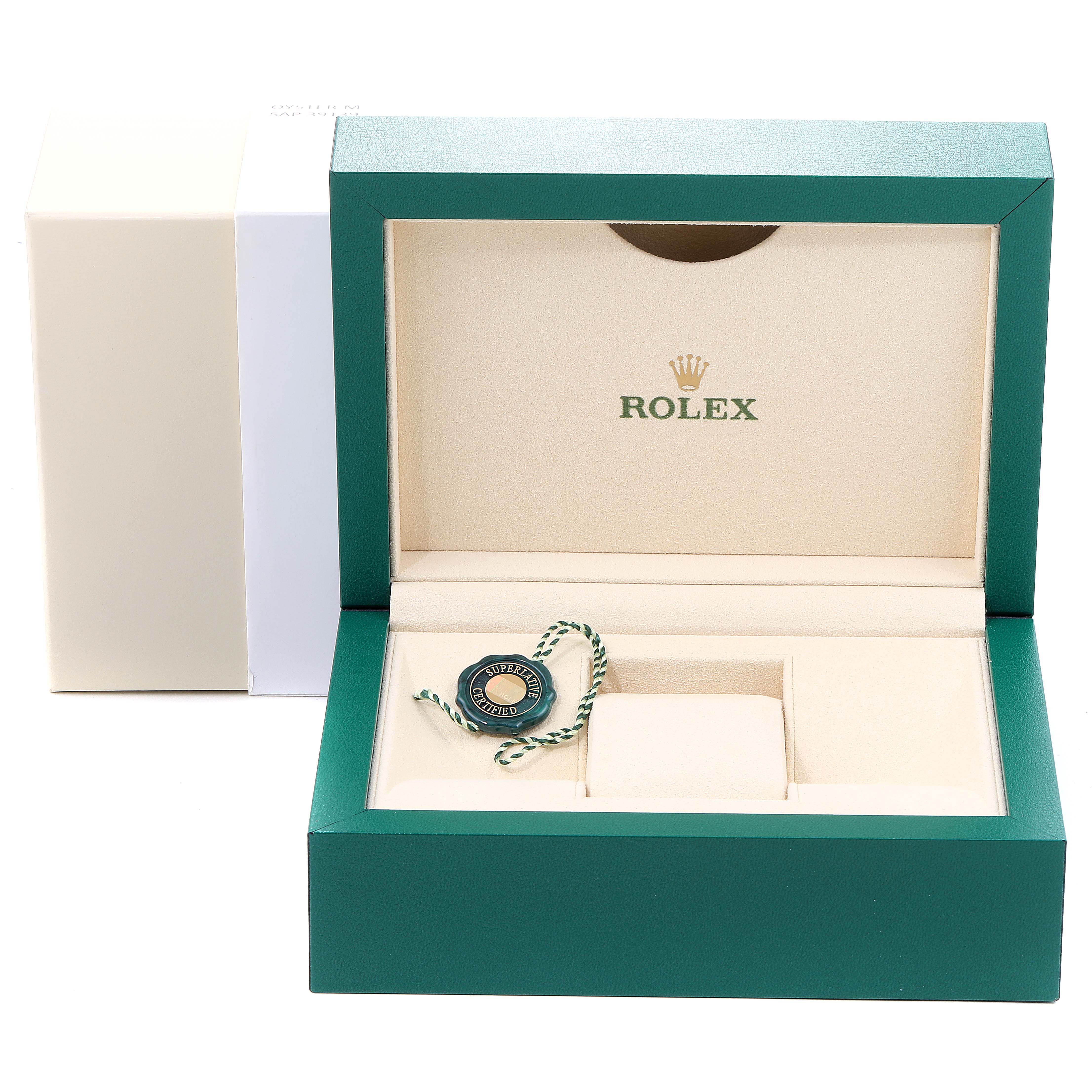 The image shows the open green and beige box of a Rolex Yacht-Master 116655 Men
s Rose Gold Black Dial 116655 Men
s Rose Gold Black Dial watch, along with a green tag inside.