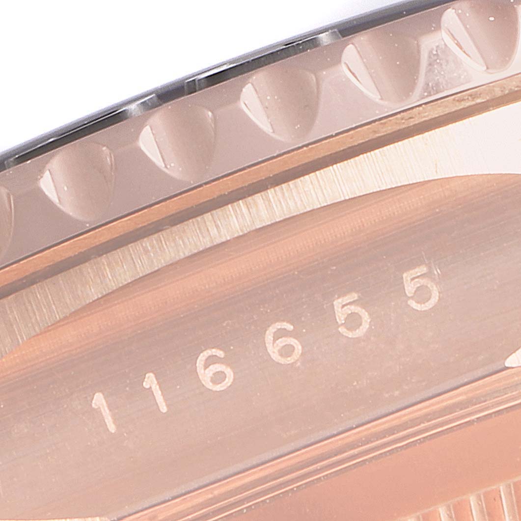 The image shows a close-up of the Rolex Yacht-Master 116655 Men
s Rose Gold Black Dial 116655 Men
s Rose Gold Black Dial model’s bezel and engraved serial number.
