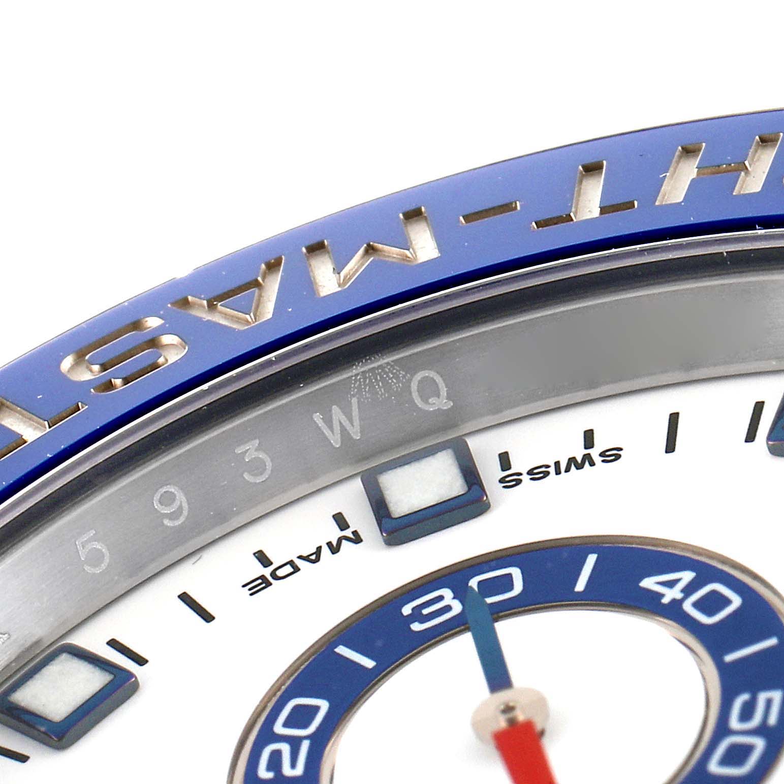 This image shows a close-up of the Rolex Yacht-Master 116680 Men's Stainless Steel White Dial 116680 Men's Stainless Steel White Dial watch, focusing on the bezel and a portion of the dial.