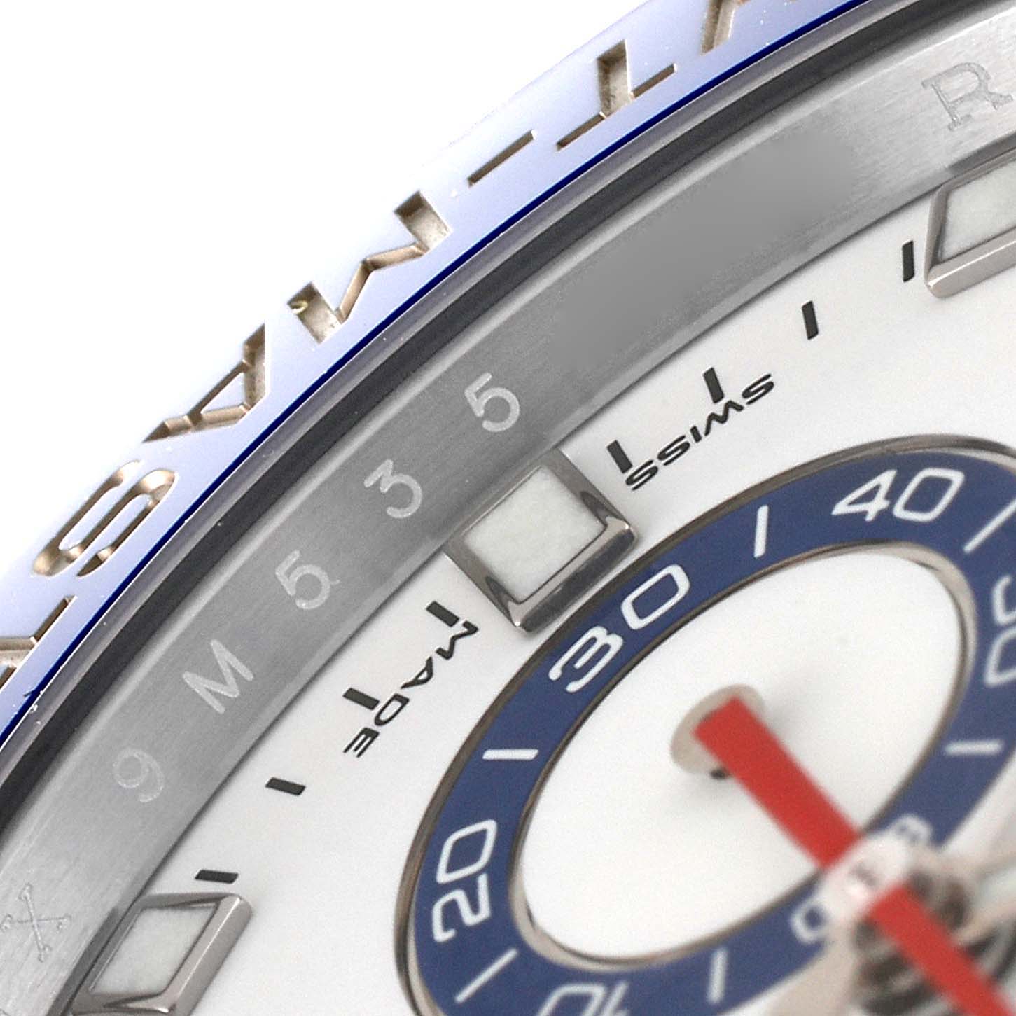 This close-up image of the Rolex Yacht-Master 116680 Men
s Stainless Steel White Dial 116680 Men
s Stainless Steel White Dial watch showcases its dial, bezel, and part of its second hand.