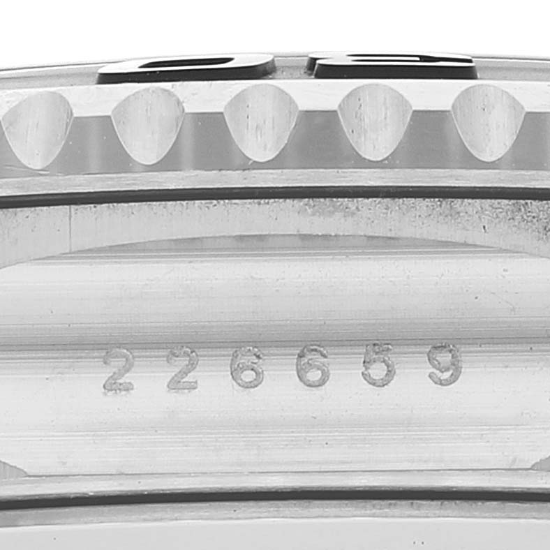 This image shows a close-up view of the bezel and case side of the Rolex Yacht-Master 226659 Men
s White Gold Black Dial 226659 Men
s White Gold Black Dial, displaying its serial number.