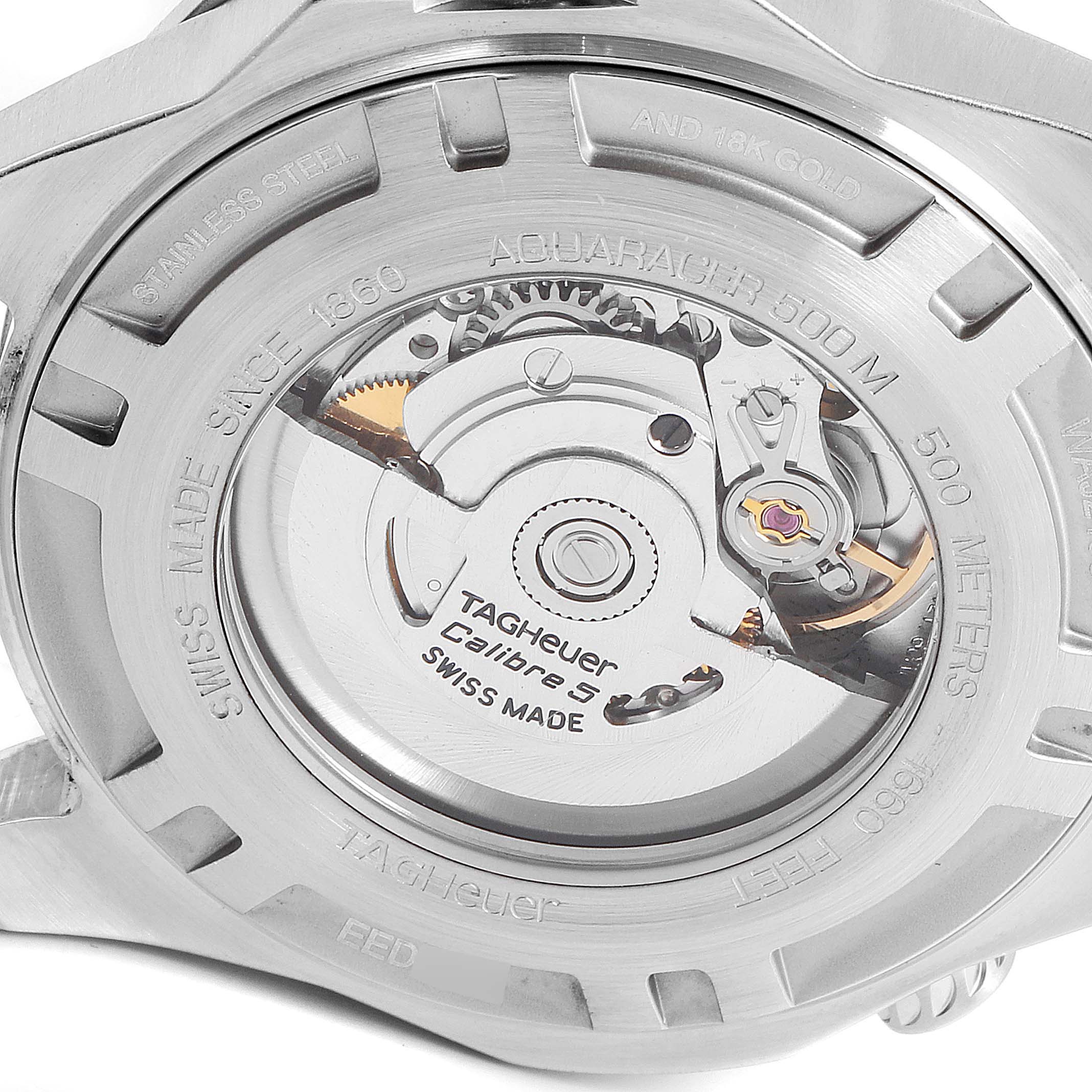 This is the back view of a Tag Heuer Aquaracer WAJ2150.BA0870 Men
s Stainless Steel Black Dial WAJ2150.BA0870 Men
s Stainless Steel Black Dial 500M watch showing the Calibre 5 movement.