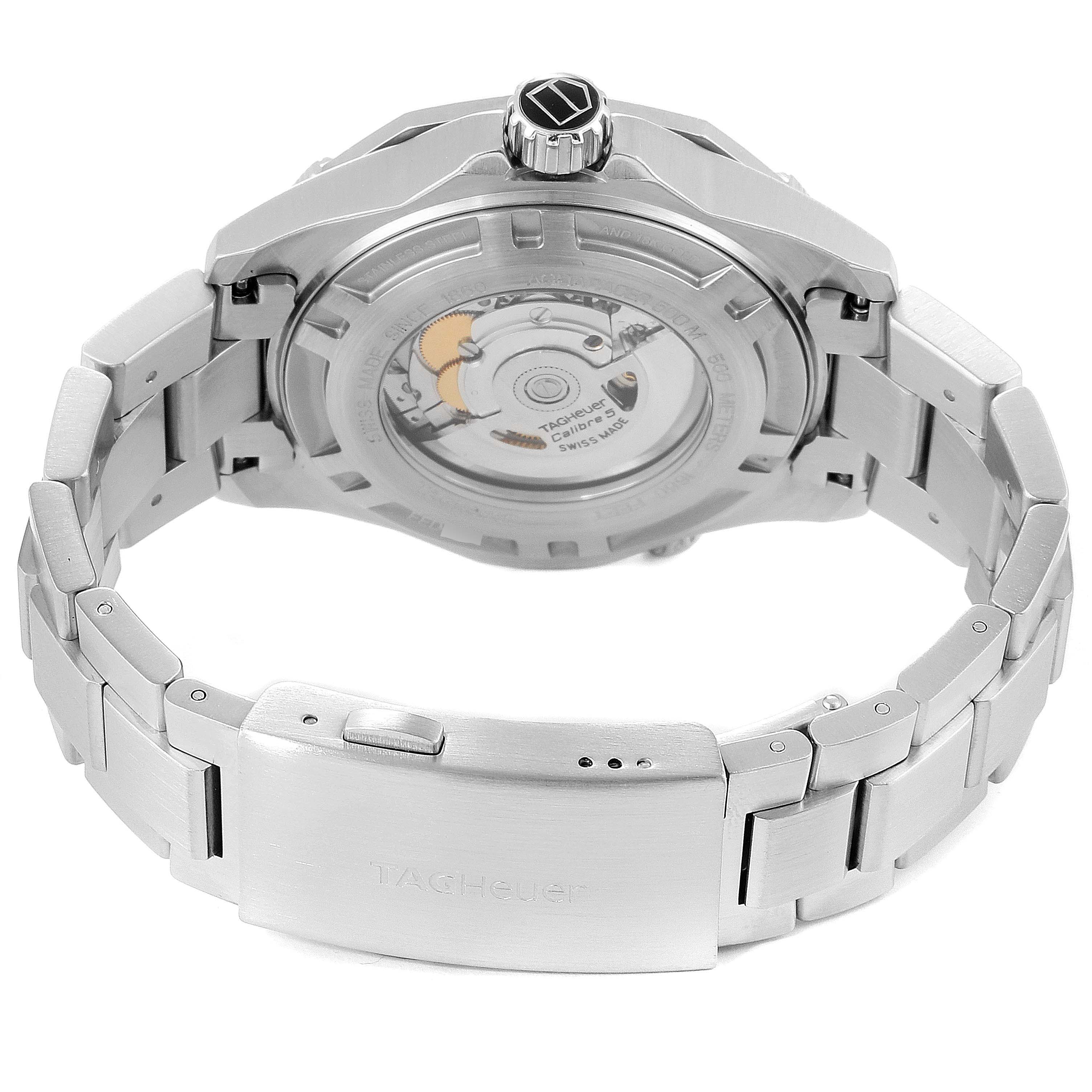 The image shows the back view of the Tag Heuer Aquaracer WAJ2150.BA0870 Men
s Stainless Steel Black Dial WAJ2150.BA0870 Men
s Stainless Steel Black Dial watch, highlighting the automatic movement and stainless steel bracelet.