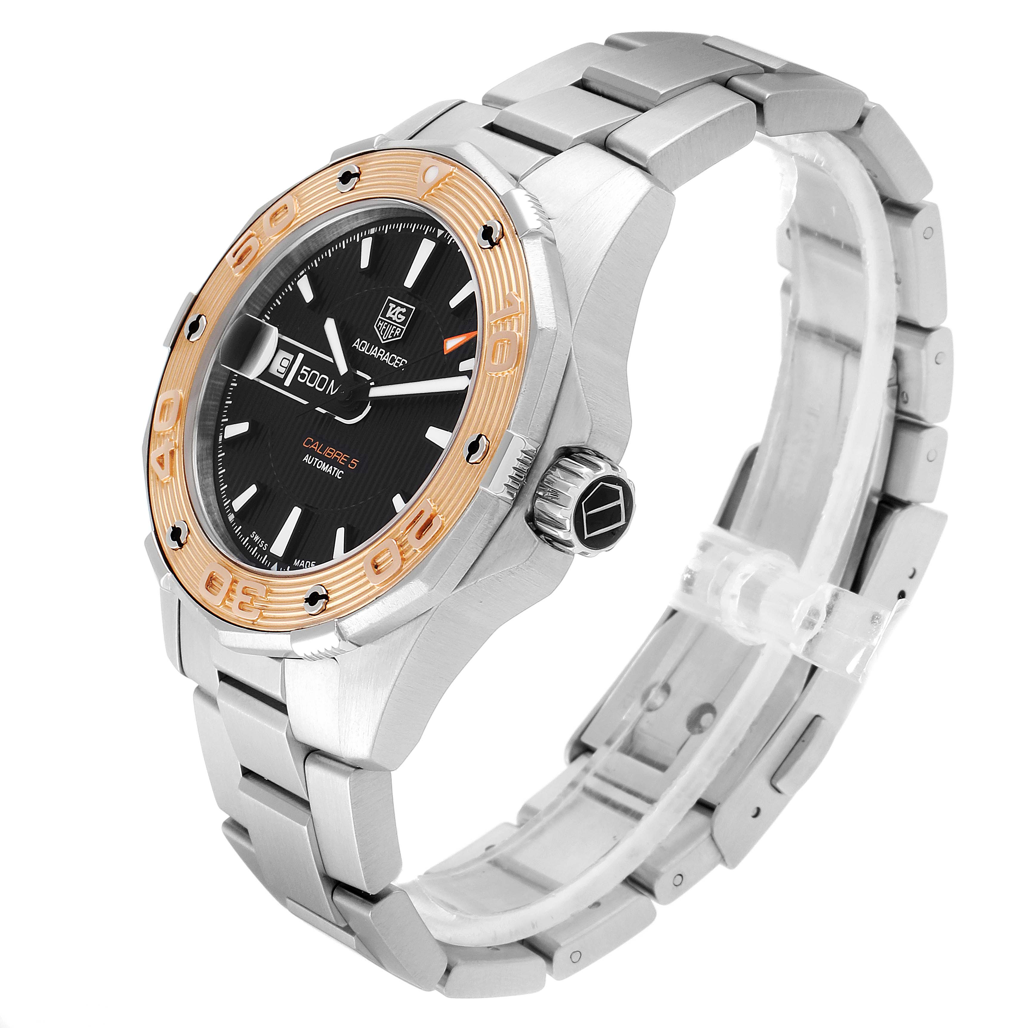 The Tag Heuer Aquaracer WAJ2150.BA0870 Men
s Stainless Steel Black Dial WAJ2150.BA0870 Men
s Stainless Steel Black Dial watch is shown at a slight angle, highlighting the bracelet, crown, and face with a black dial and gold bezel.