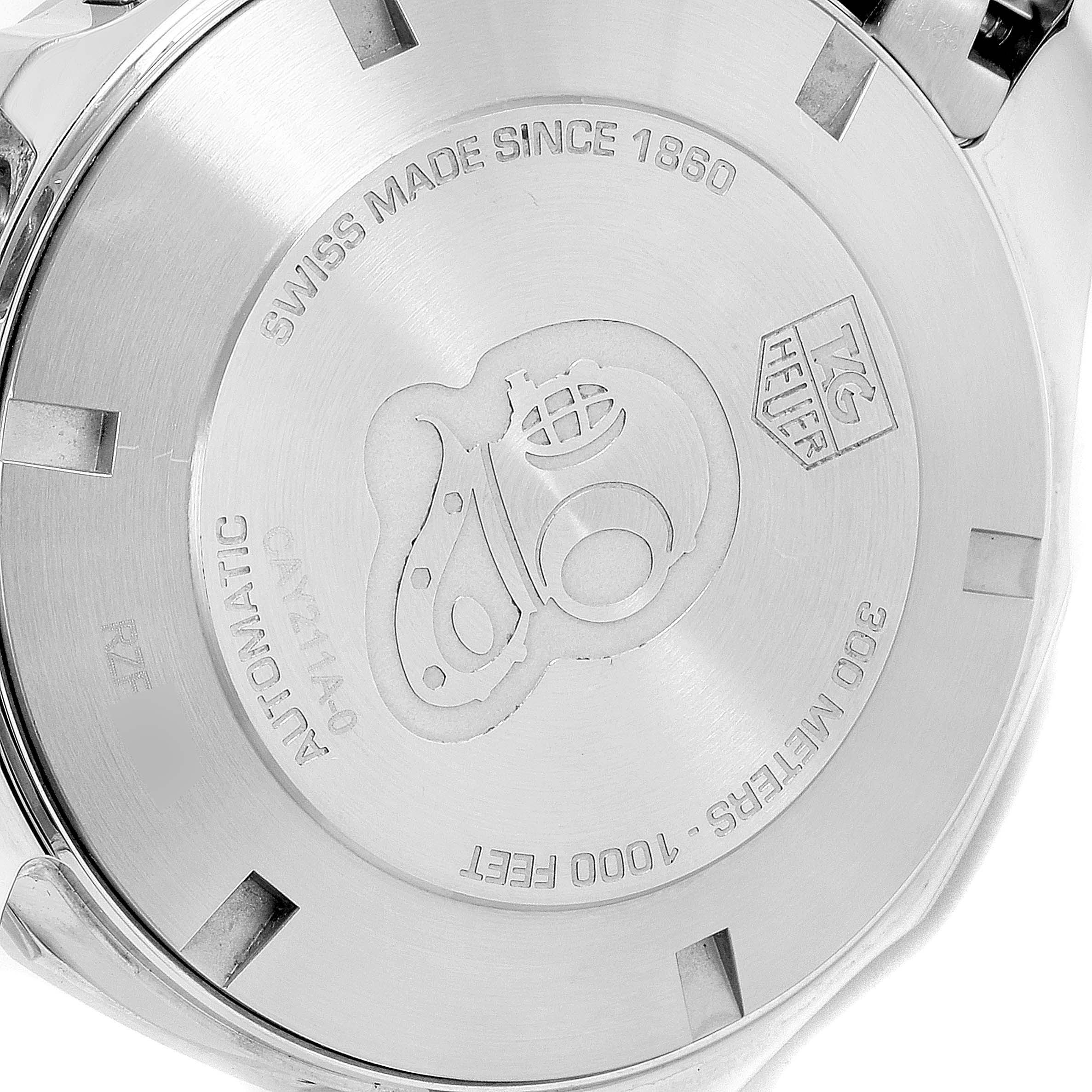The image shows the case back of the Tag Heuer Aquaracer CAY211A.BA0927 Men's Stainless Steel Black Dial CAY211A.BA0927 Men's Stainless Steel Black Dial watch with engravings and brand markings.