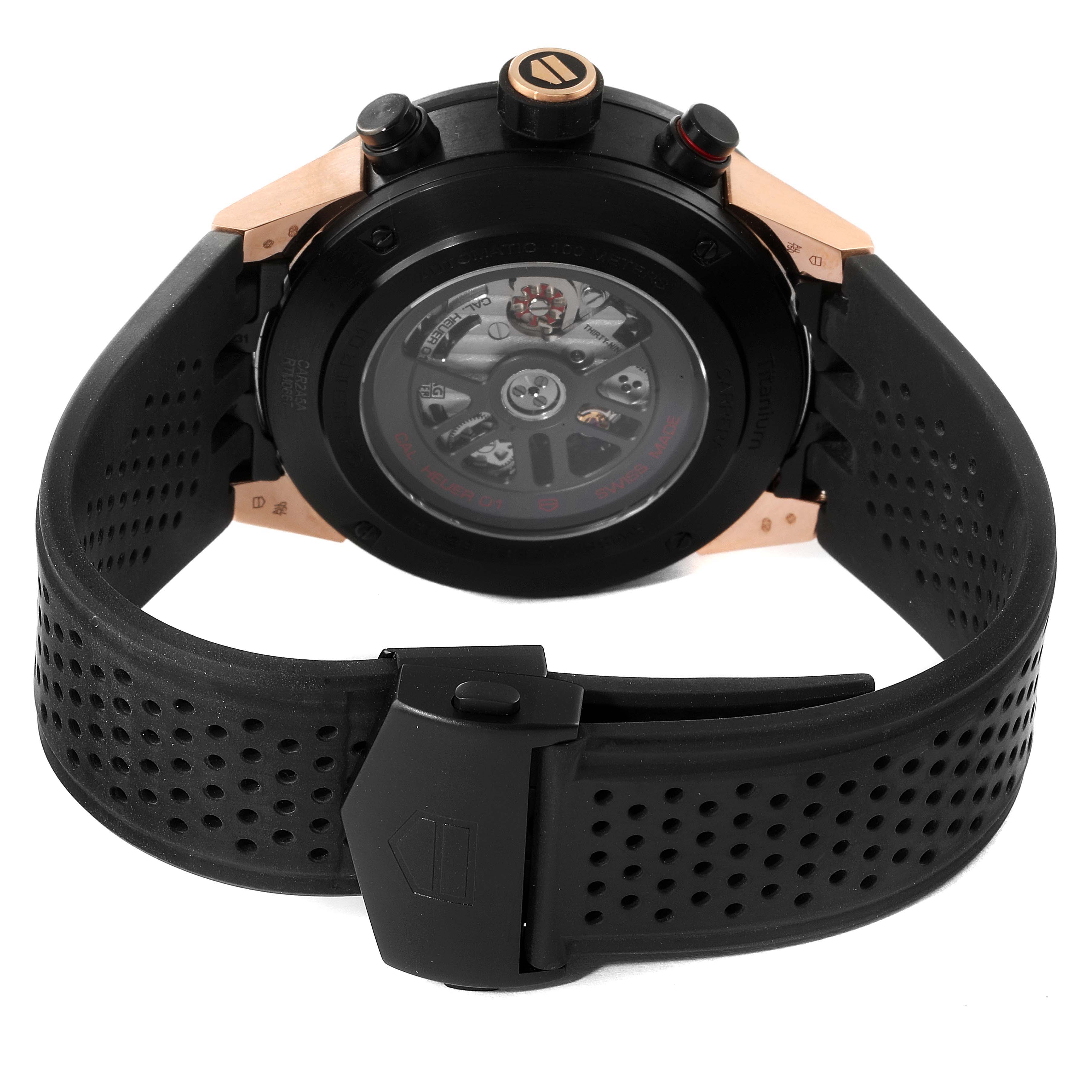 This image shows the back view of a Tag Heuer Carrera CAR2A5A.FT6044 Men's Rose Gold Black Dial CAR2A5A.FT6044 Men's Rose Gold Black Dial watch, highlighting its exposed movement and perforated black strap.