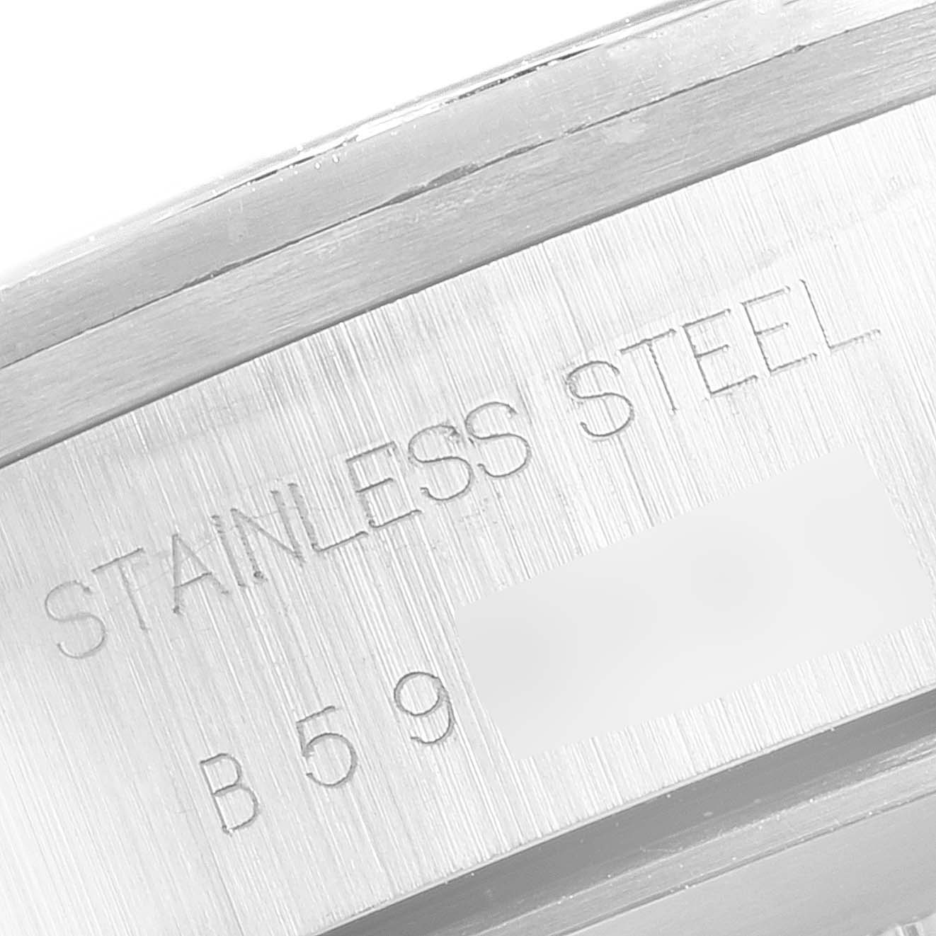 This image shows a close-up of the case back engraving on a Tudor Big Block 79160 Men
s Stainless Steel Black Dial 79160 Men
s Stainless Steel Black Dial watch, highlighting the "STAINLESS STEEL" text and part of the serial number.