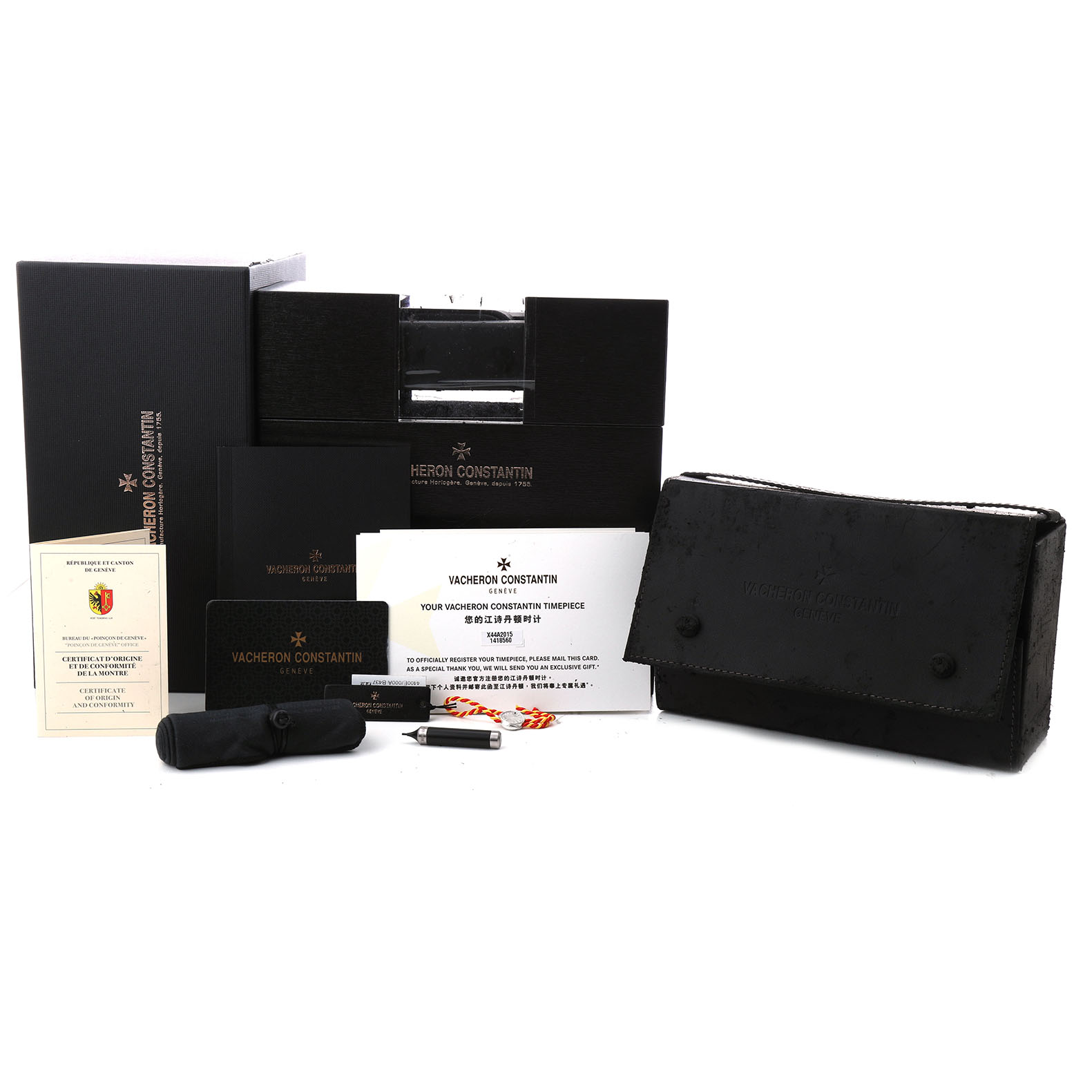 The image shows the packaging and accessories of a Vacheron Constantin Fiftysix 4400E/000A-B437 Men's Stainless Steel Silver Dial watch, including the box, papers, and tools.