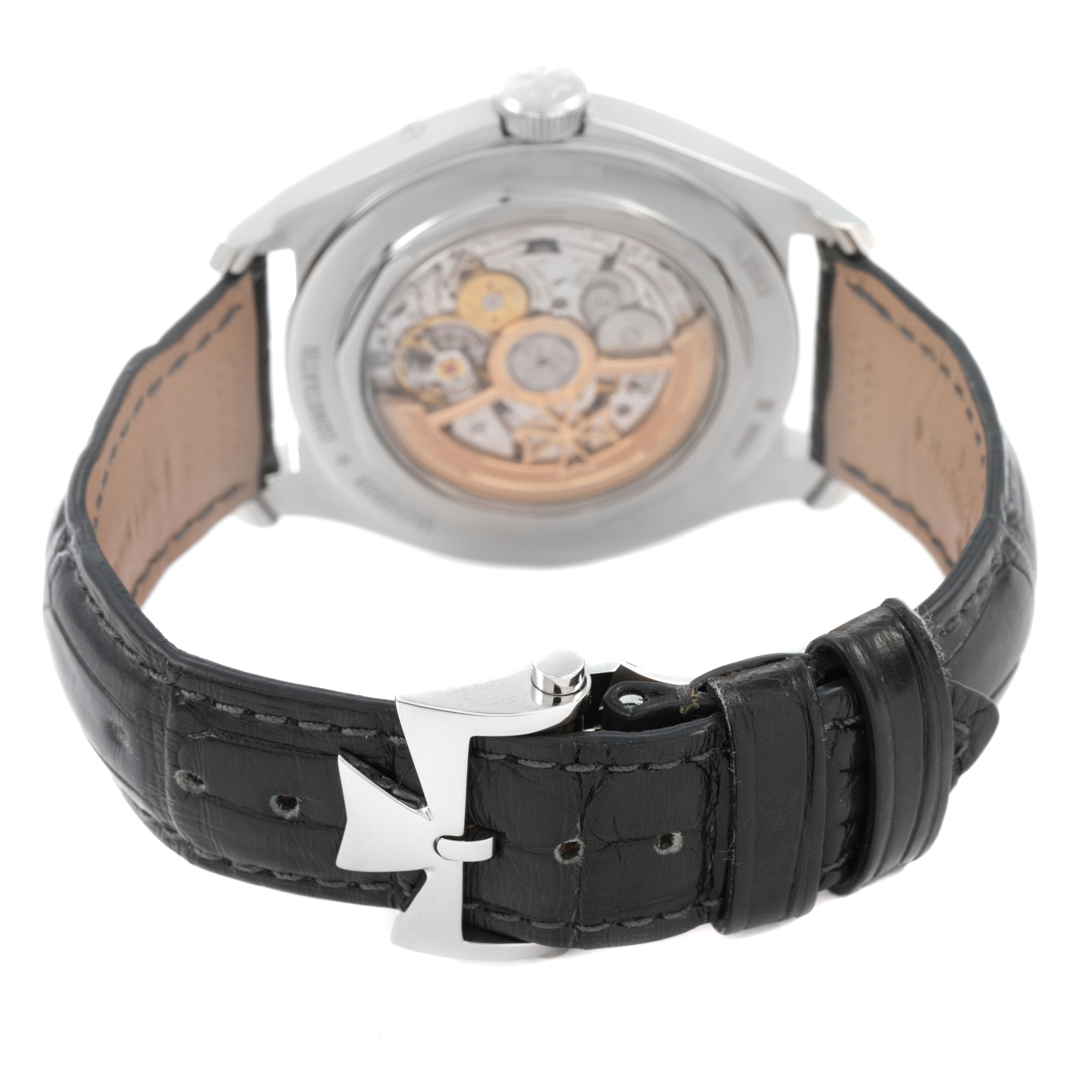The Vacheron Constantin Fiftysix 4400E/000A-B437 Men's Stainless Steel Silver Dial is shown from the back, displaying the movement and leather strap with buckle.