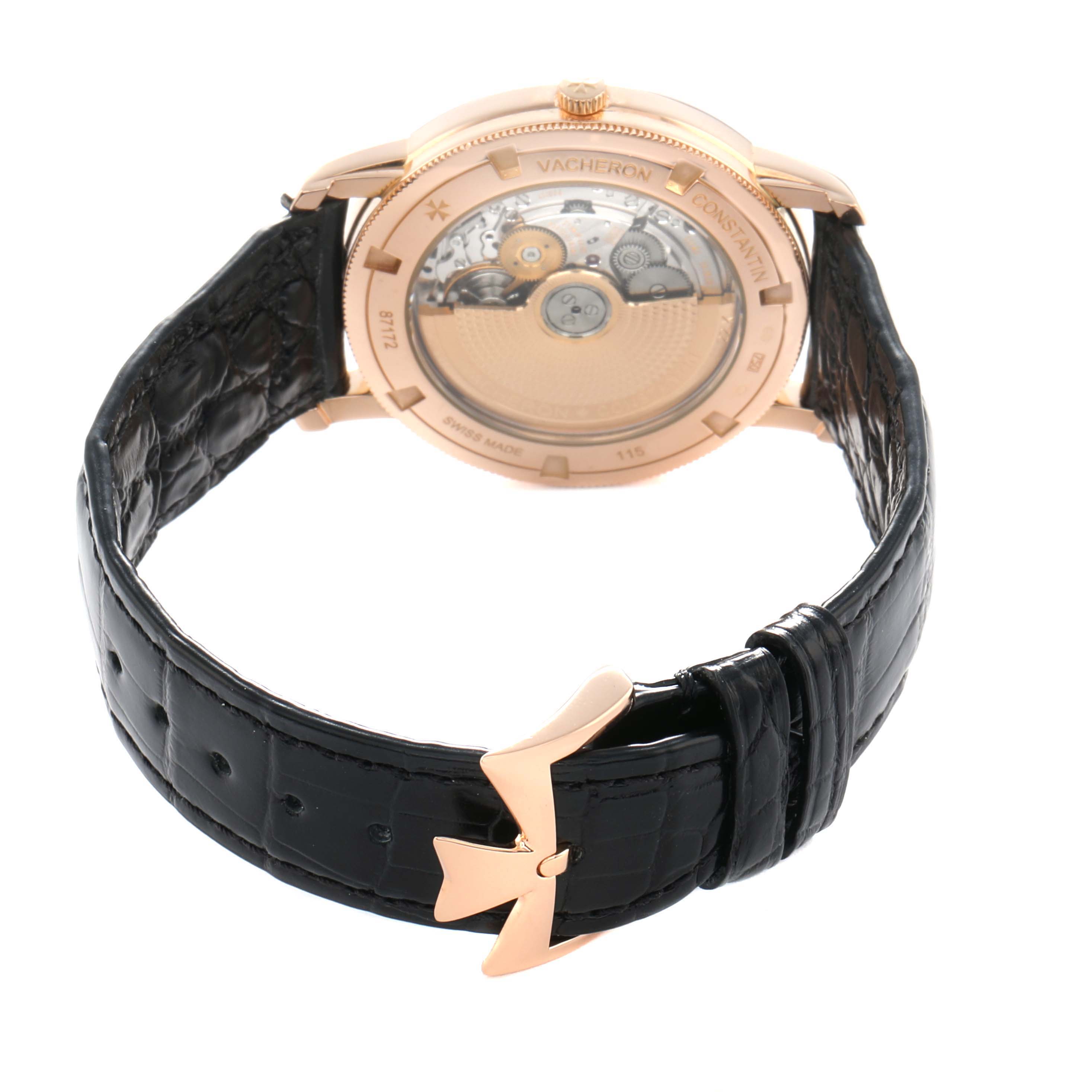The image shows the Vacheron Constantin Traditionnelle 87172 Men
s Rose Gold Black Dial model from the back, highlighting the movement and clasp details.