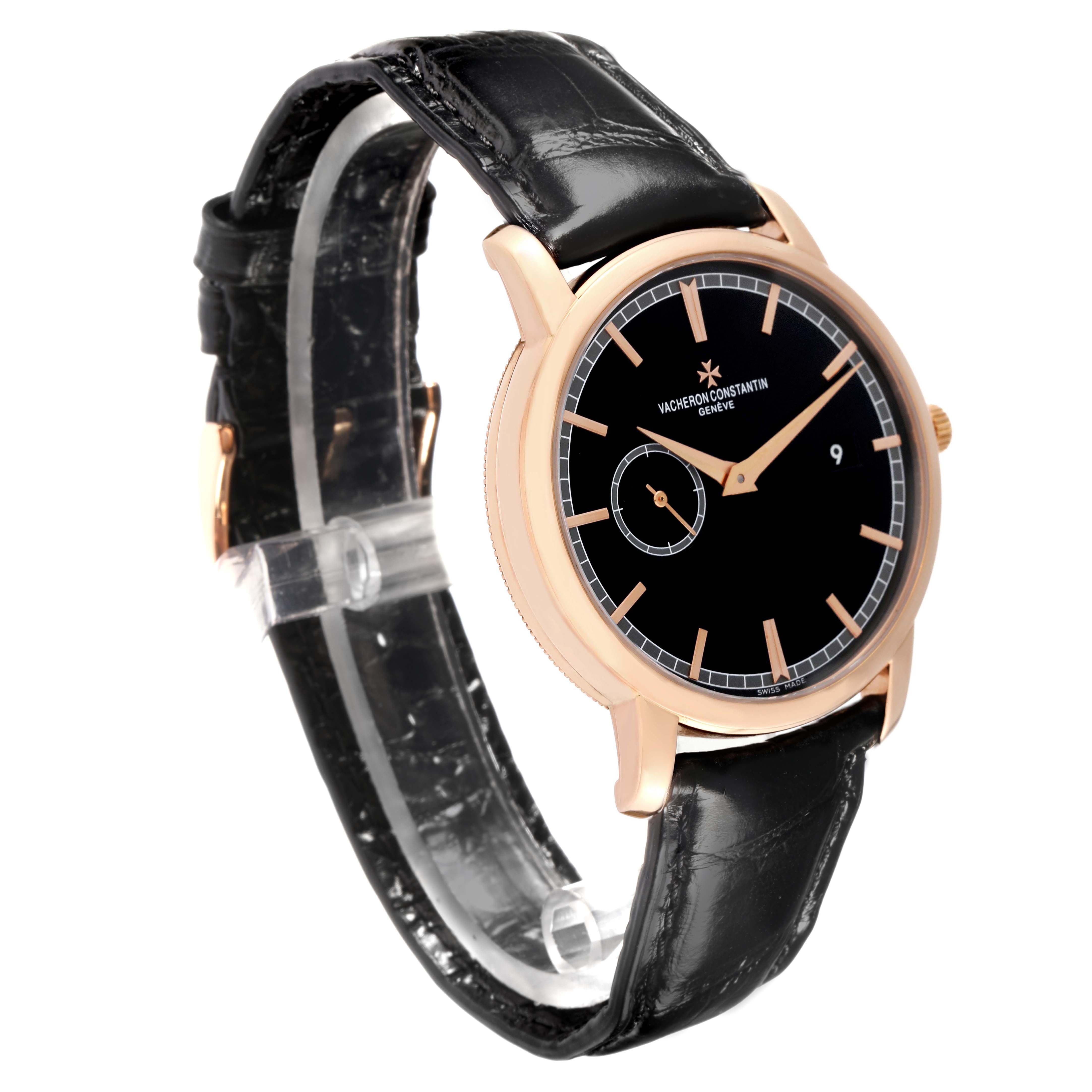 The Vacheron Constantin Traditionnelle 87172 Men
s Rose Gold Black Dial watch is shown at a side angle, highlighting the black dial, gold case, and leather strap.