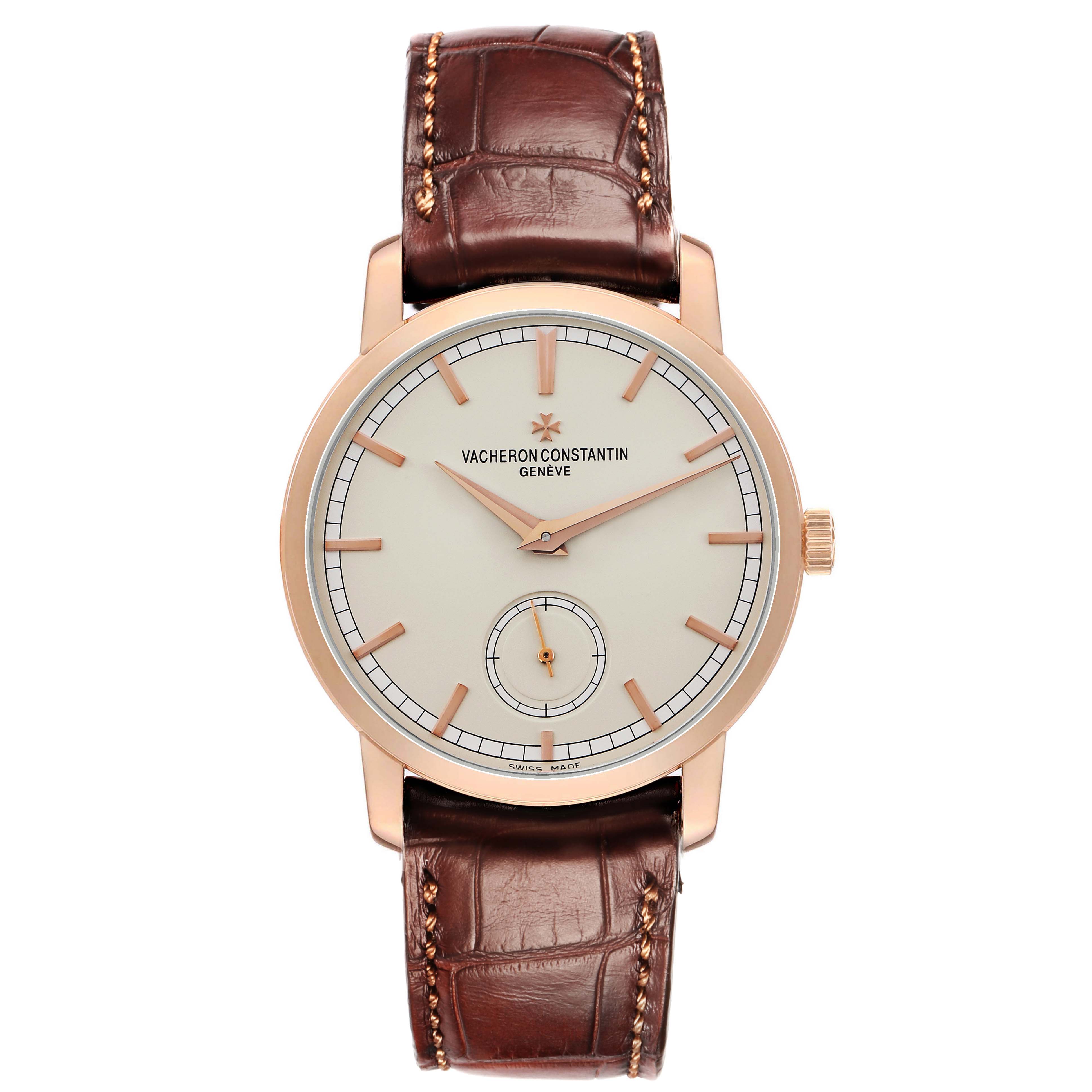 The Vacheron Constantin Traditionnelle 82172 Men
s Rose Gold Silver Dial watch is shown from a top-down angle, displaying its dial, hands, case, and leather strap.