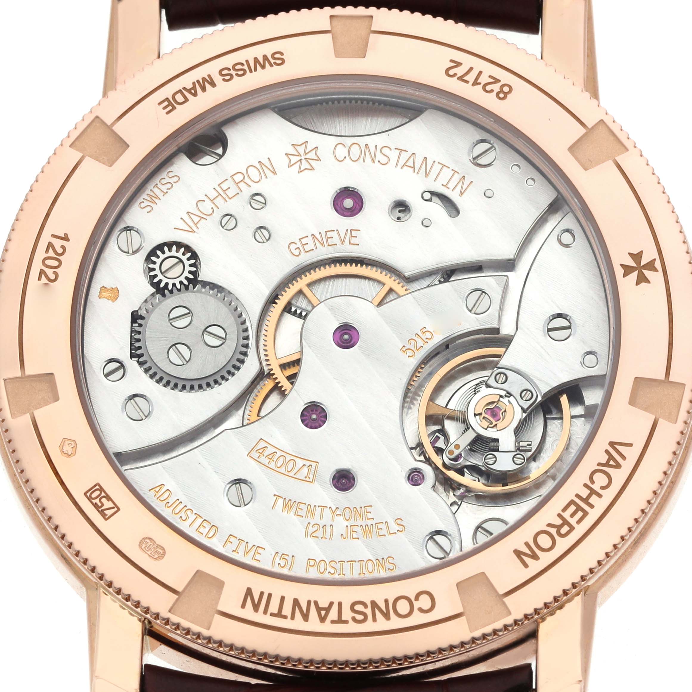 The image shows the case back of the Vacheron Constantin Traditionnelle 82172 Men
s Rose Gold Silver Dial watch, highlighting its intricate movement and engravings.