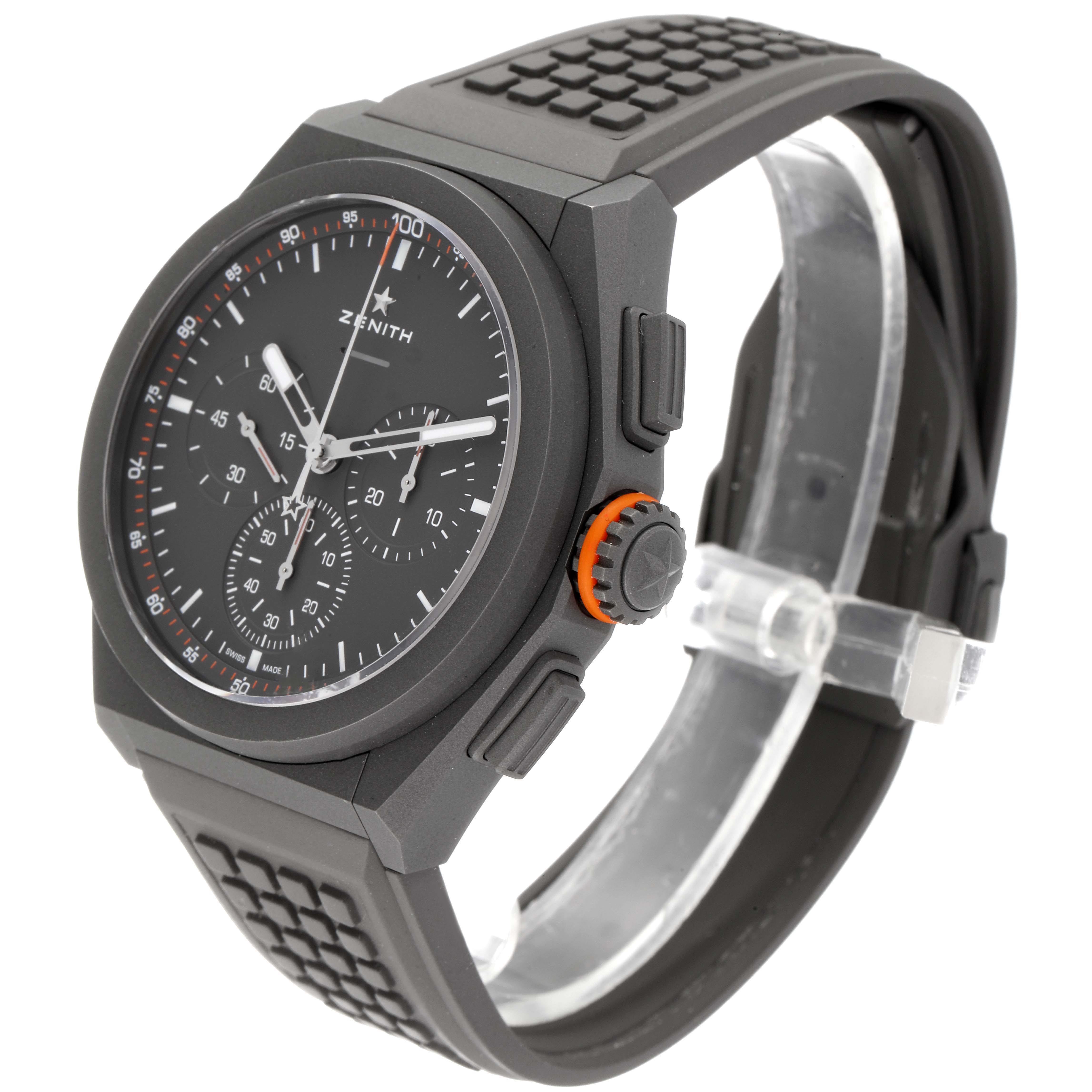 The Zenith Defy 97.9000.9004/01.R787 Men
s Titanium Grey Dial 97.9000.9004/01.R787 Men
s Titanium Grey Dial model watch is shown at an angle highlighting the face, rubber strap, and crown.