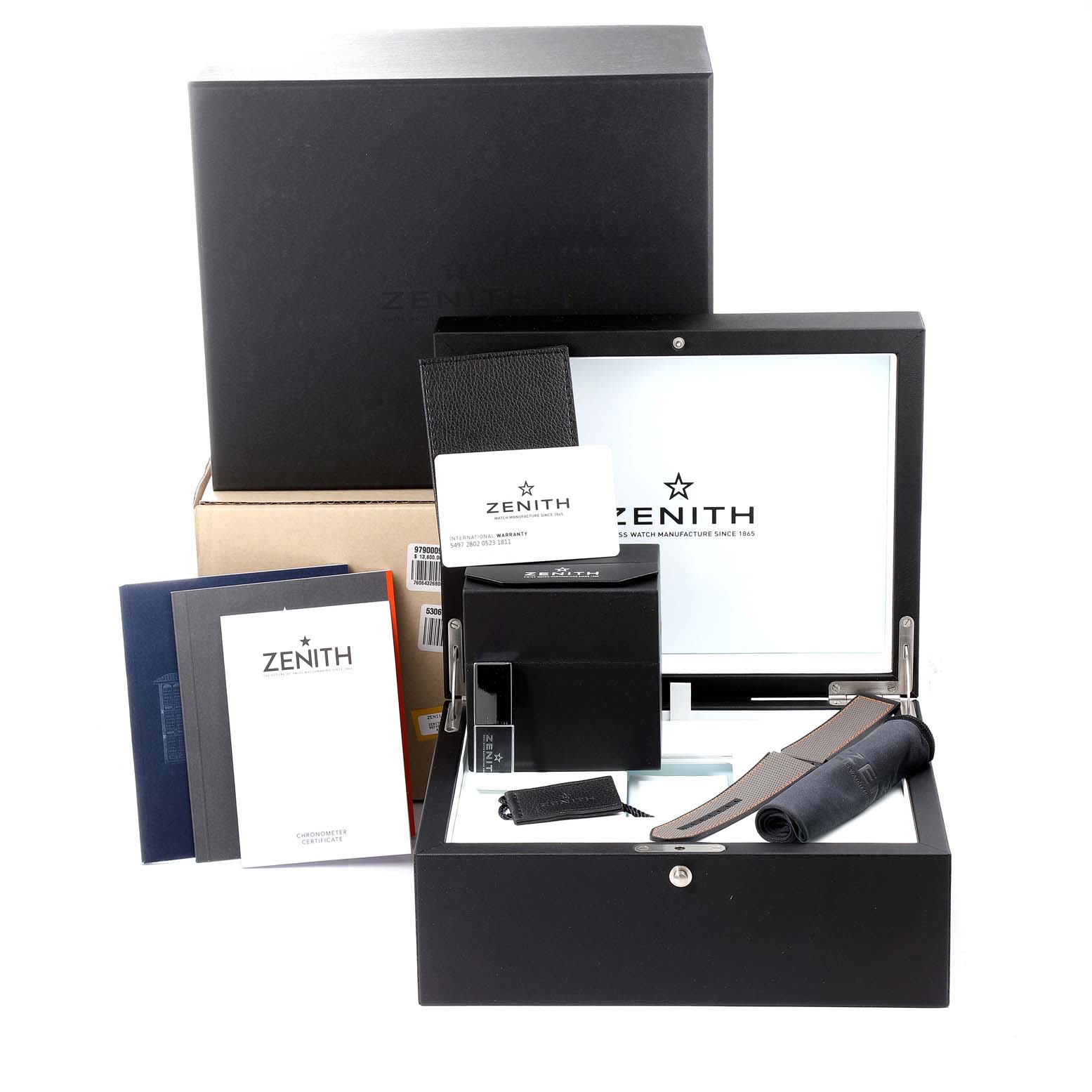 The image shows the Zenith Defy 97.9000.9004/01.R787 Men
s Titanium Grey Dial 97.9000.9004/01.R787 Men
s Titanium Grey Dial watch packaging, including the watch box, manuals, and accessories, from a front angle.