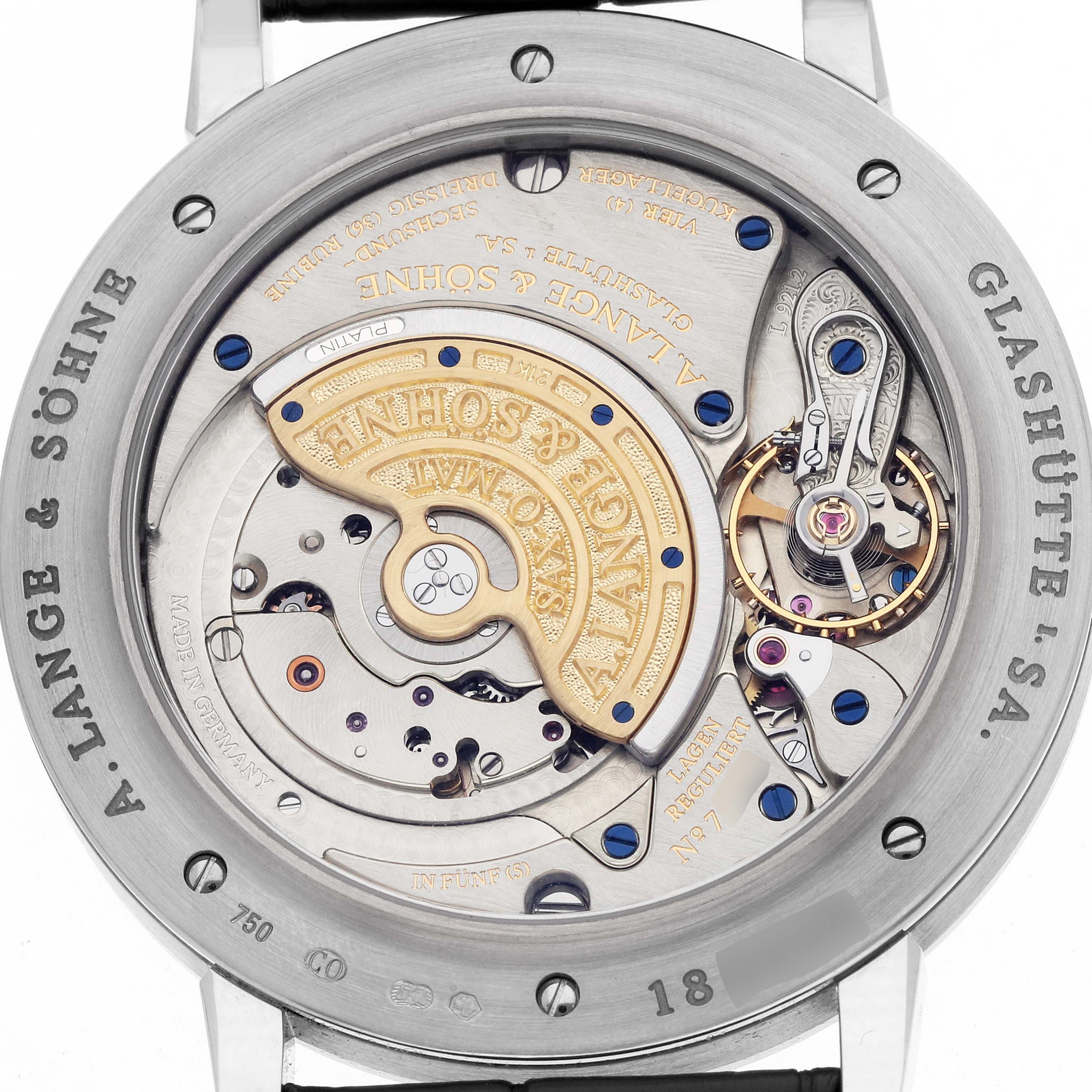 The image shows the back of an A. Lange 
Sohne Saxonia 307.029 Men
s White Gold Black Dial watch, highlighting its intricate movement and rotor mechanisms.