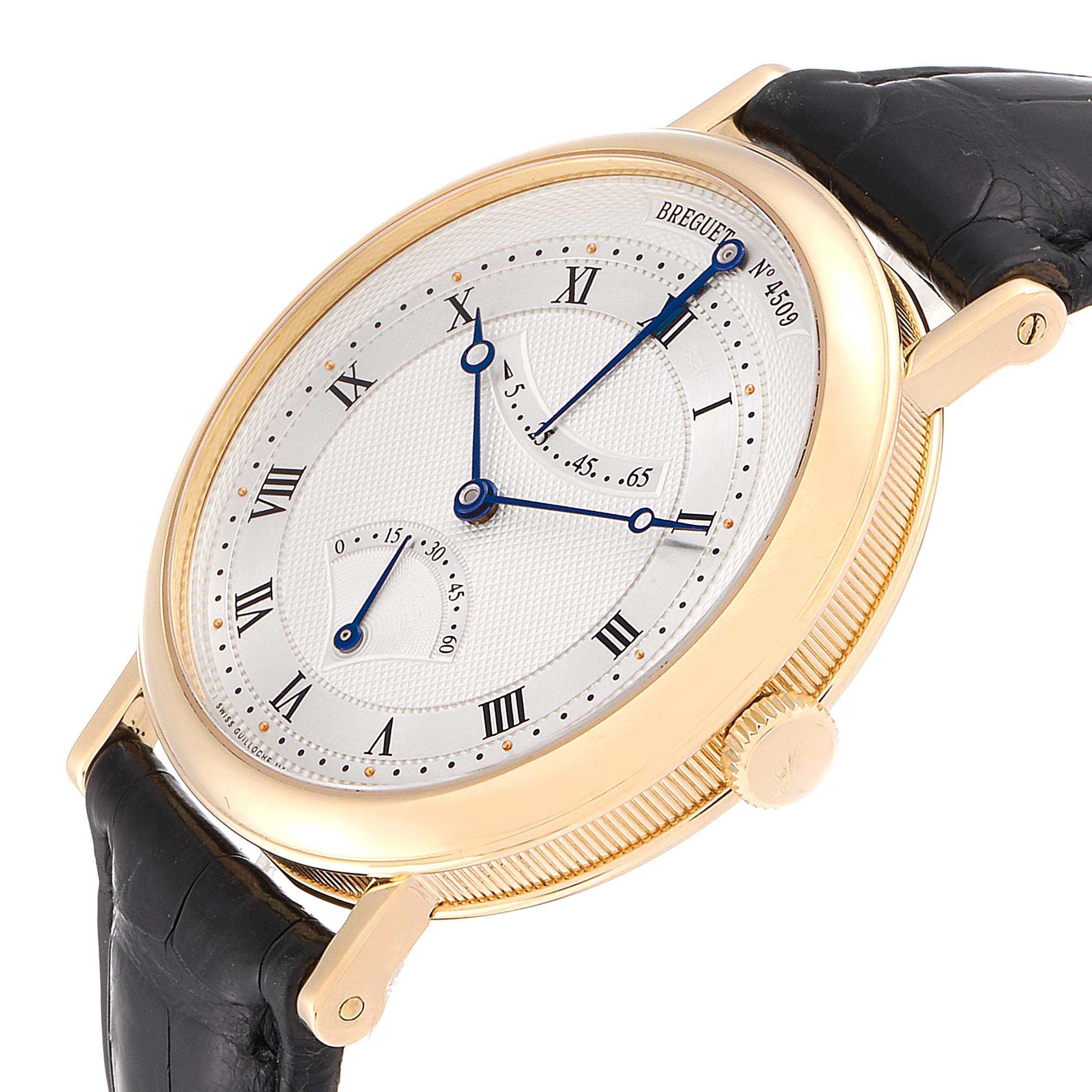 The image shows a Breguet Classique 5207BA/12/9V6 Men's Yellow Gold Silver Dial 5207BA/12/9V6 Men's Yellow Gold Silver Dial watch viewed from an oblique angle, highlighting the dial, case, and part of the strap.