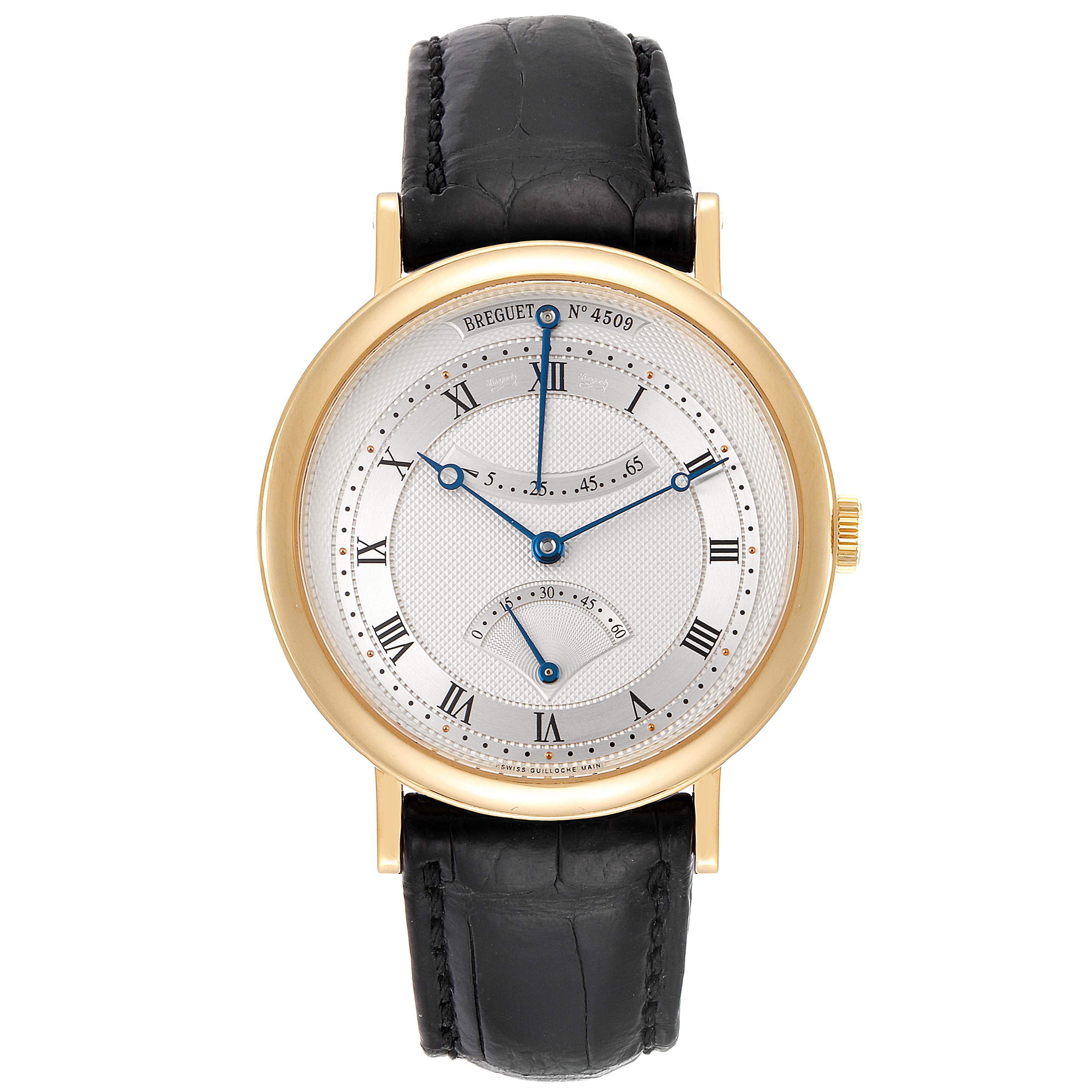 The image shows a front view of a Breguet Classique 5207BA/12/9V6 Men's Yellow Gold Silver Dial 5207BA/12/9V6 Men's Yellow Gold Silver Dial watch, highlighting its gold case, white dial with Roman numerals, and black leather strap.