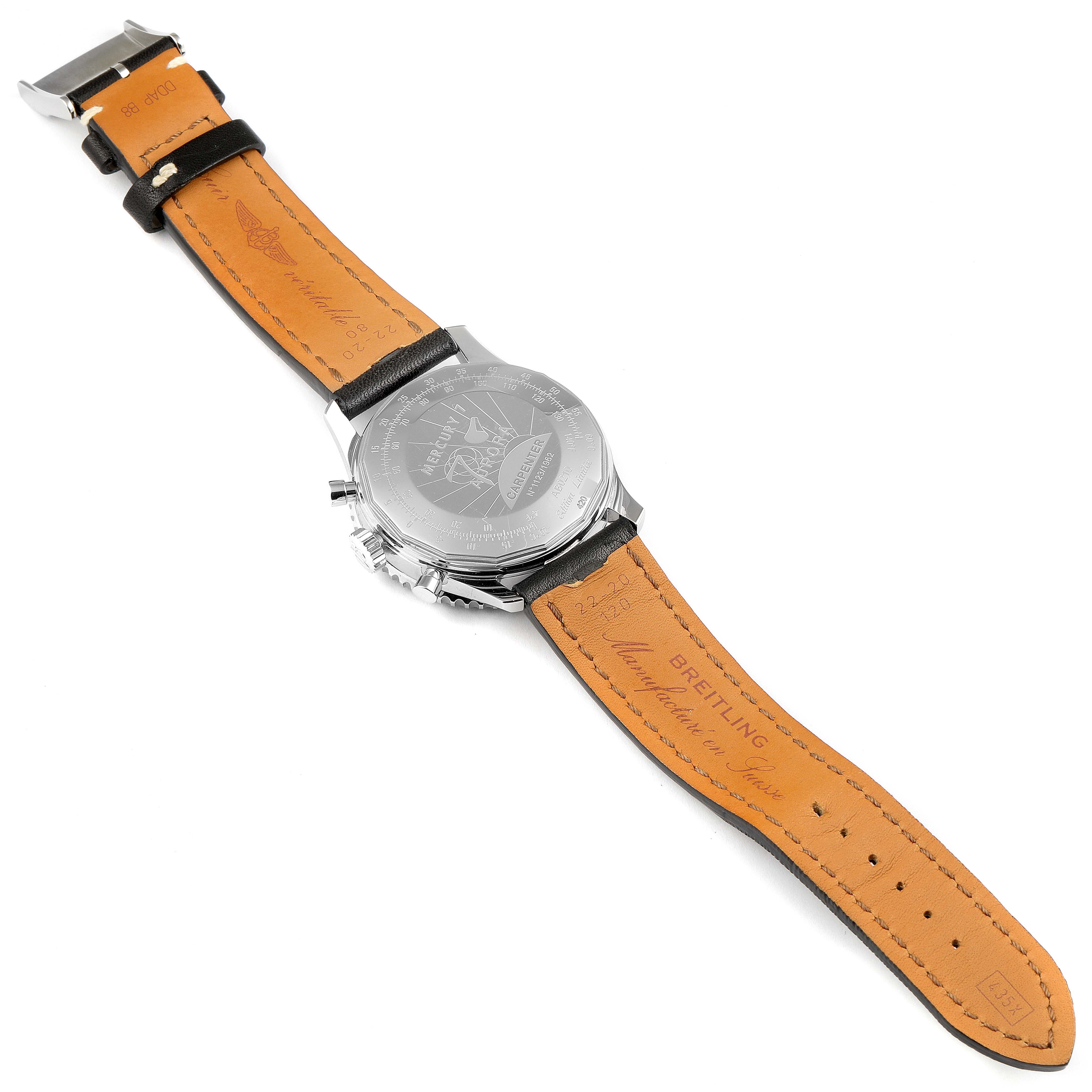 The image shows the back of the Navitimer by Breitling, highlighting its leather strap and engraved case back.