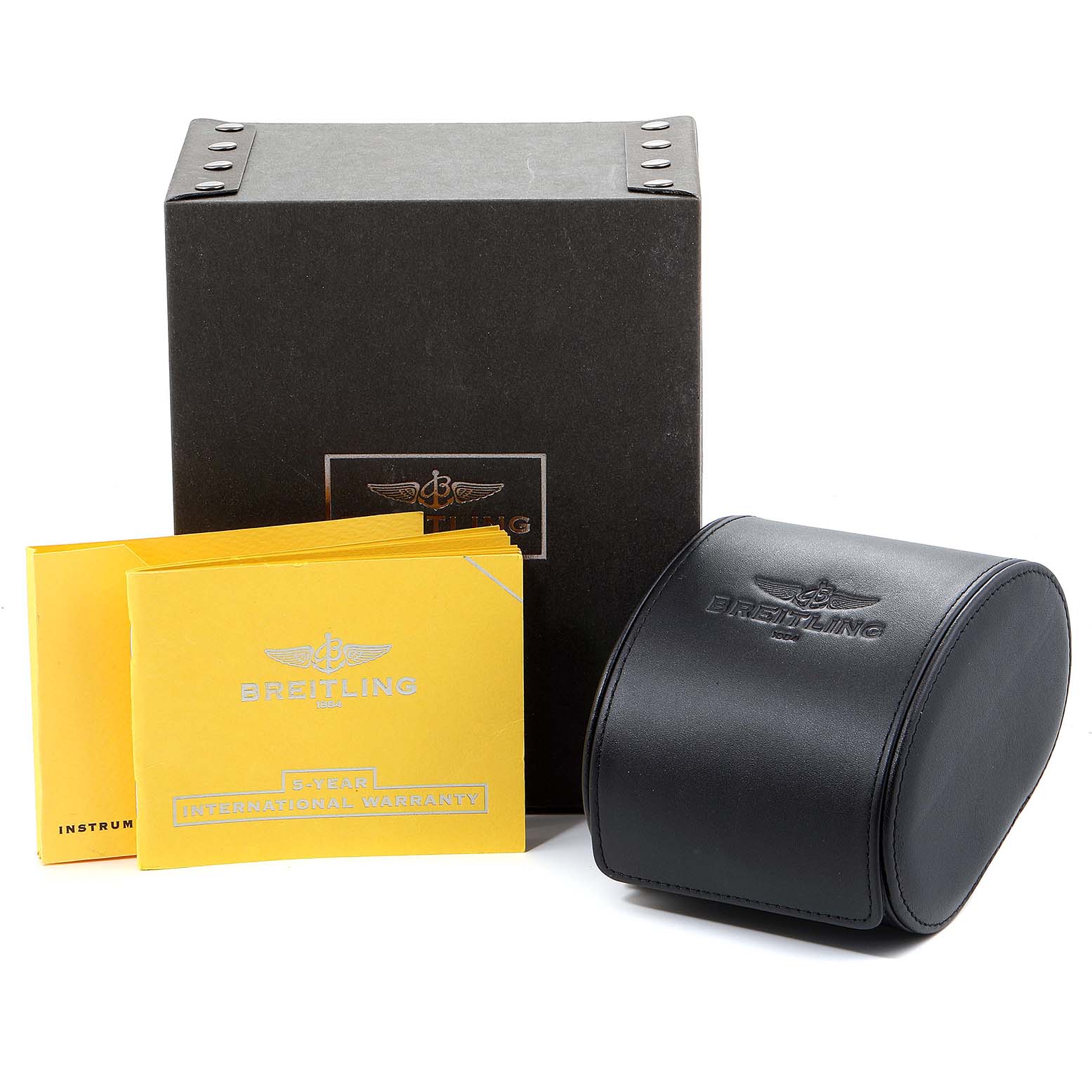 The image shows the packaging, warranty card, and storage case for a Breitling Navitimer AB0210 Men
s Stainless Steel Black Dial AB0210 Men
s Stainless Steel Black Dial watch.