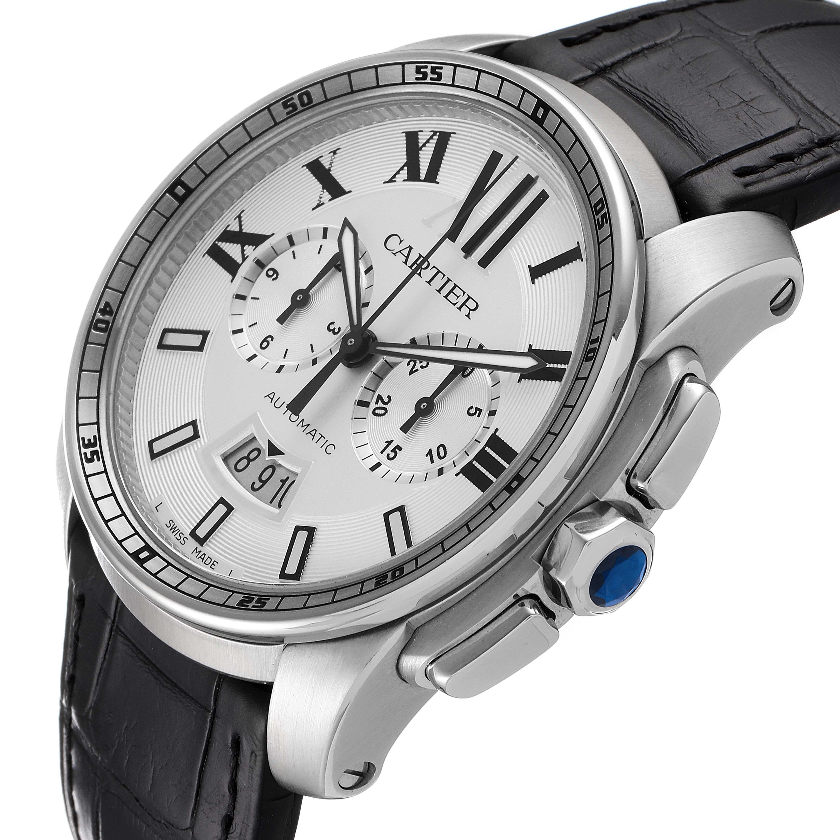 The image shows a Calibre de Cartier watch by Cartier at an oblique angle, detailing the face, crown, and part of the leather strap.