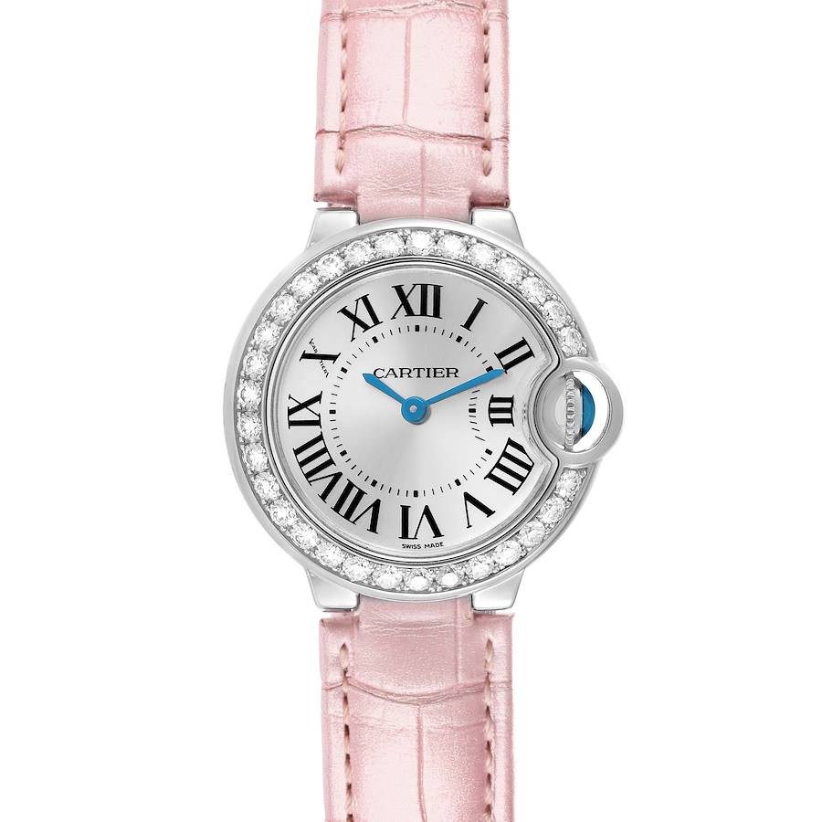The Cartier Ballon Bleu WE900351 Women's White Gold Silver Dial watch is shown from a top-down angle, displaying its pink strap, Roman numerals, and diamond-set bezel.