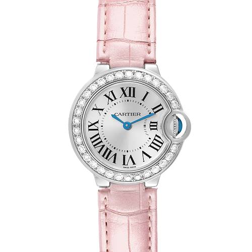 The Cartier Ballon Bleu WE900351 Women's White Gold Silver Dial watch is shown from a front angle, highlighting its round face, Roman numerals, diamond bezel, and pink strap.