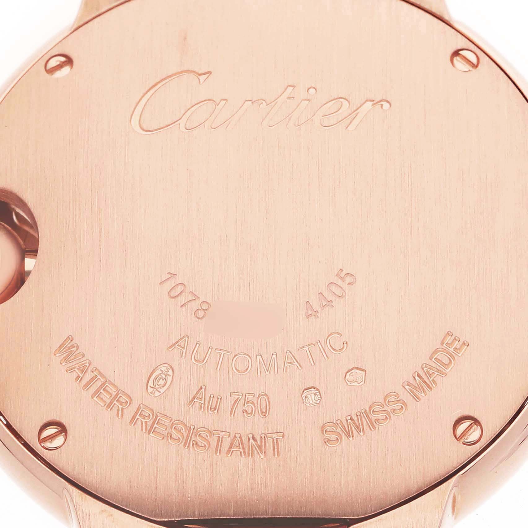 The image shows the back case of a Cartier Ballon Bleu WJBB0080 Women's Rose Gold Silver Dial watch, highlighting the brand engraving and specifications.