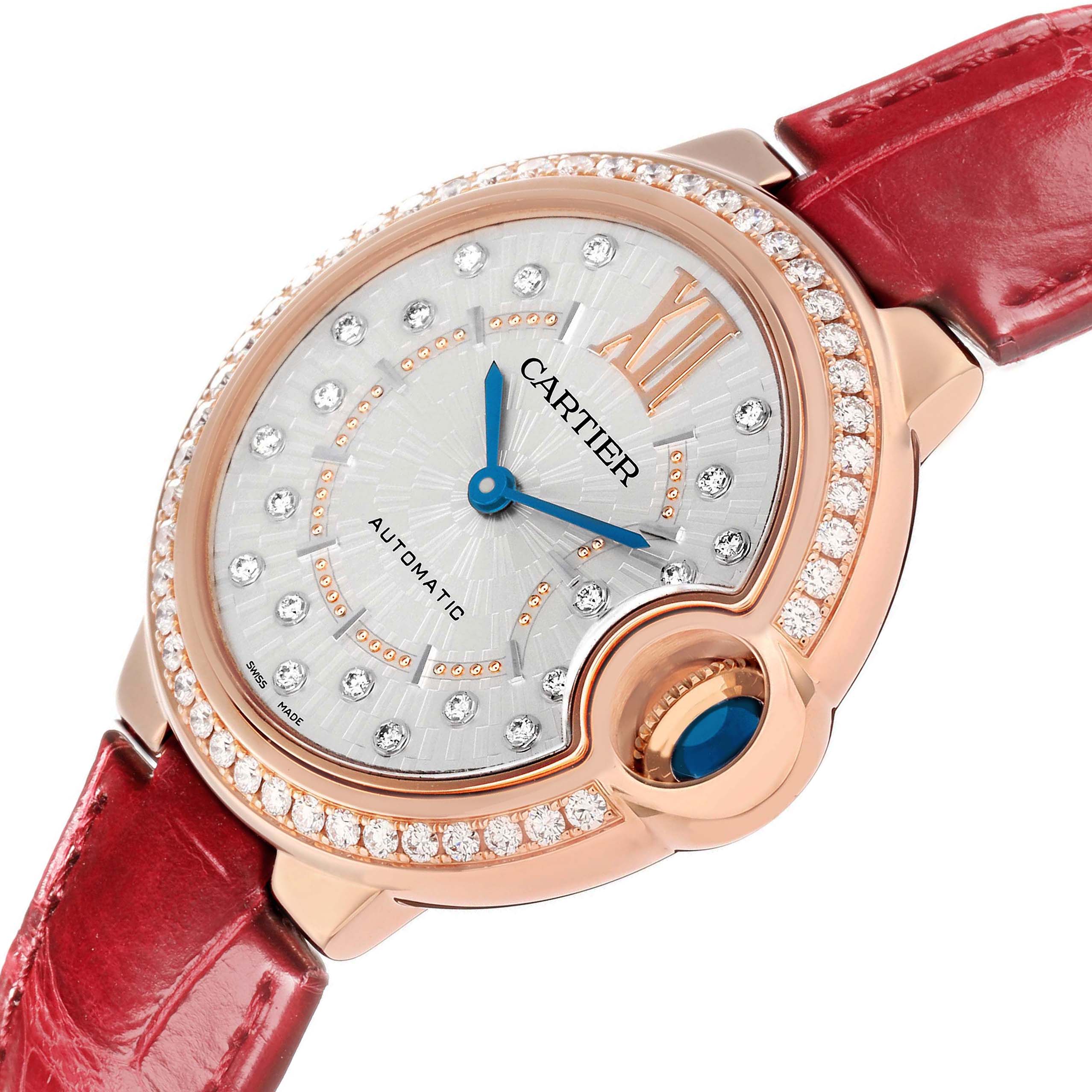 The Cartier Ballon Bleu WJBB0080 Women's Rose Gold Silver Dial watch is shown at an angled view, highlighting the dial, diamond bezel, and red strap.