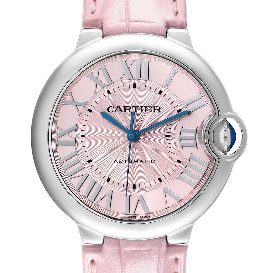 The image shows a frontal view of the Cartier Ballon Bleu WSBB0007 Women's Stainless Steel Pink Dial watch, highlighting its pink dial, Roman numerals, and blue hands.
