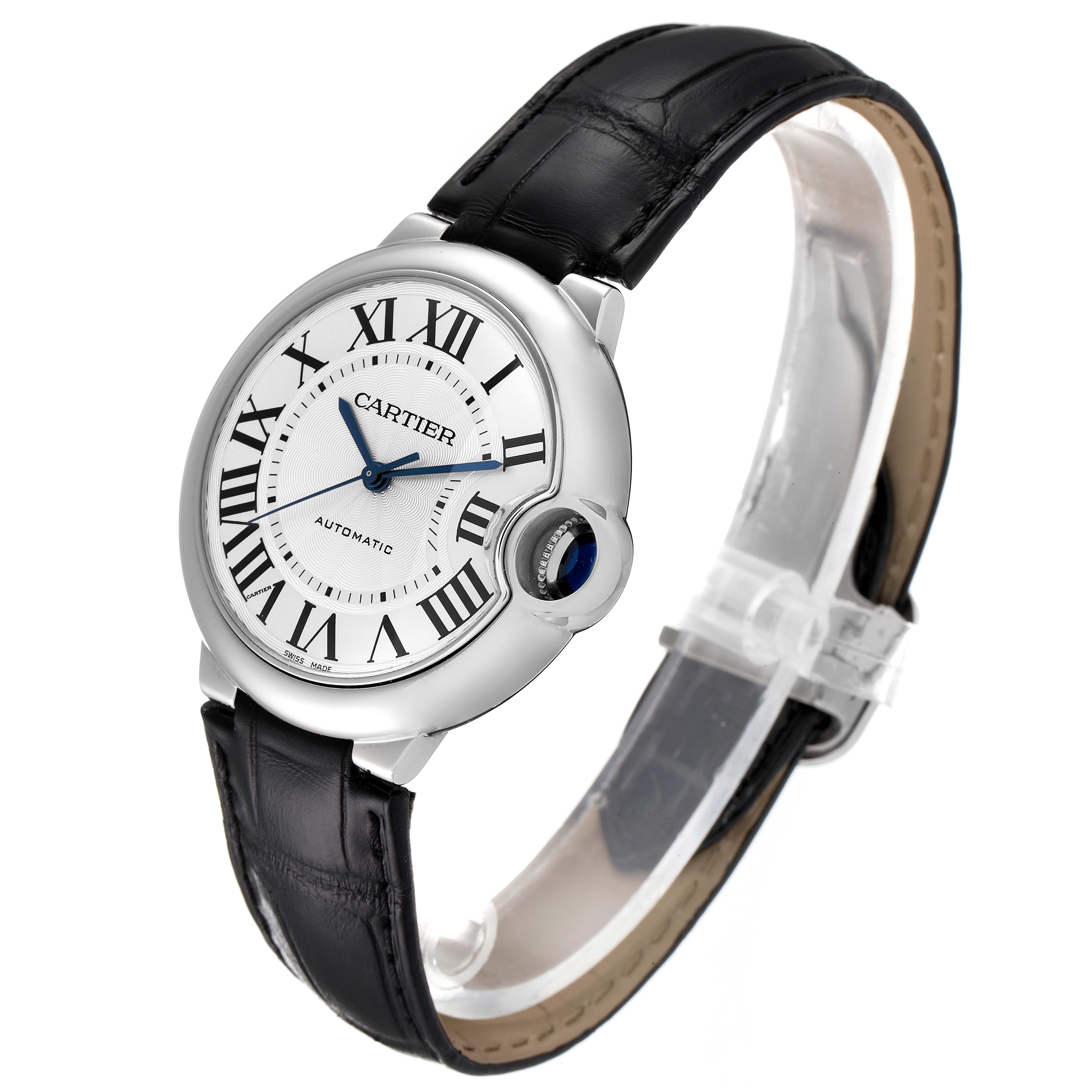 The image shows a side angle view of a Cartier Ballon Bleu W69017Z4 Men's Stainless Steel Silver Dial W69017Z4 Men's Stainless Steel Silver Dial watch, highlighting its face, leather strap, and distinctive crown.
