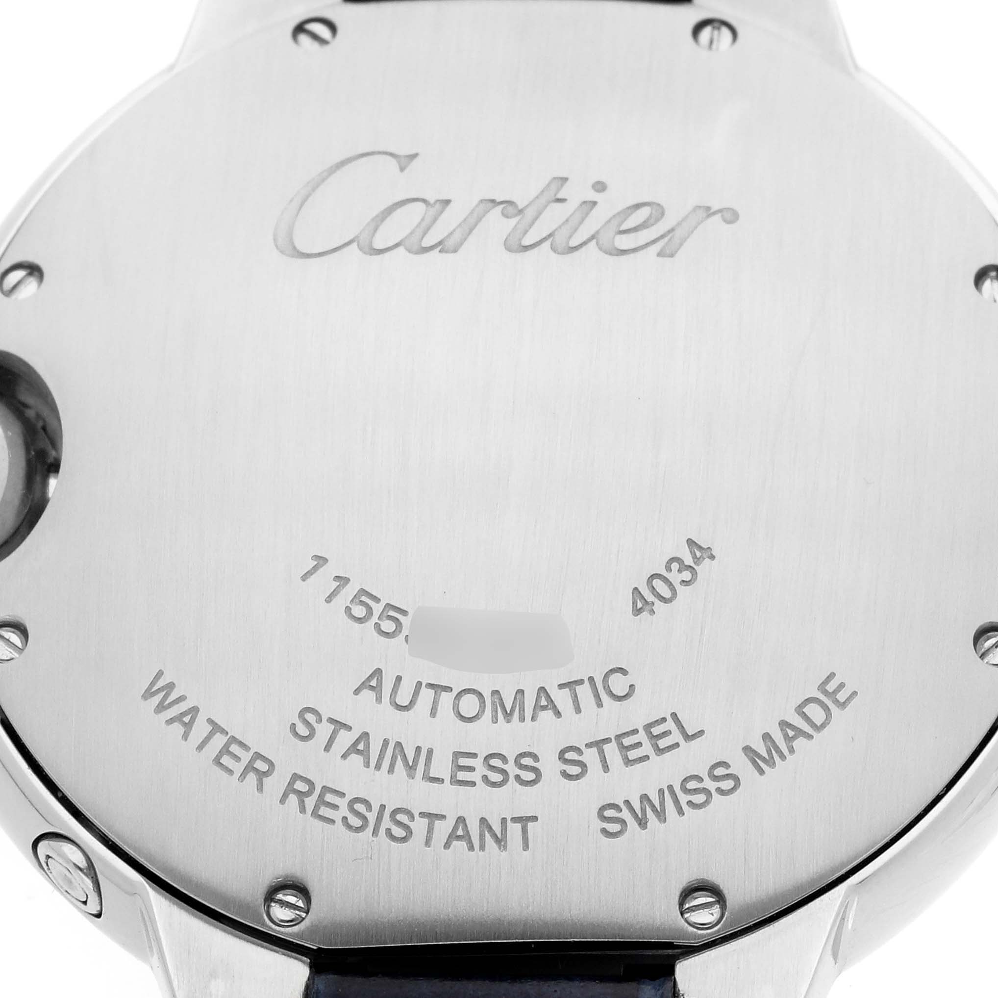 The image shows the back of a Cartier Ballon Bleu WSBB0020 Men
s Stainless Steel Silver Dial watch, highlighting branding and specifications like "Automatic" and "Stainless Steel."