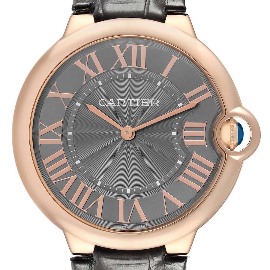 The Cartier Ballon Bleu W6920089 Men
s Rose Gold Grey Dial watch is shown from the front, highlighting the dial, Roman numerals, and crown with the signature blue cabochon.