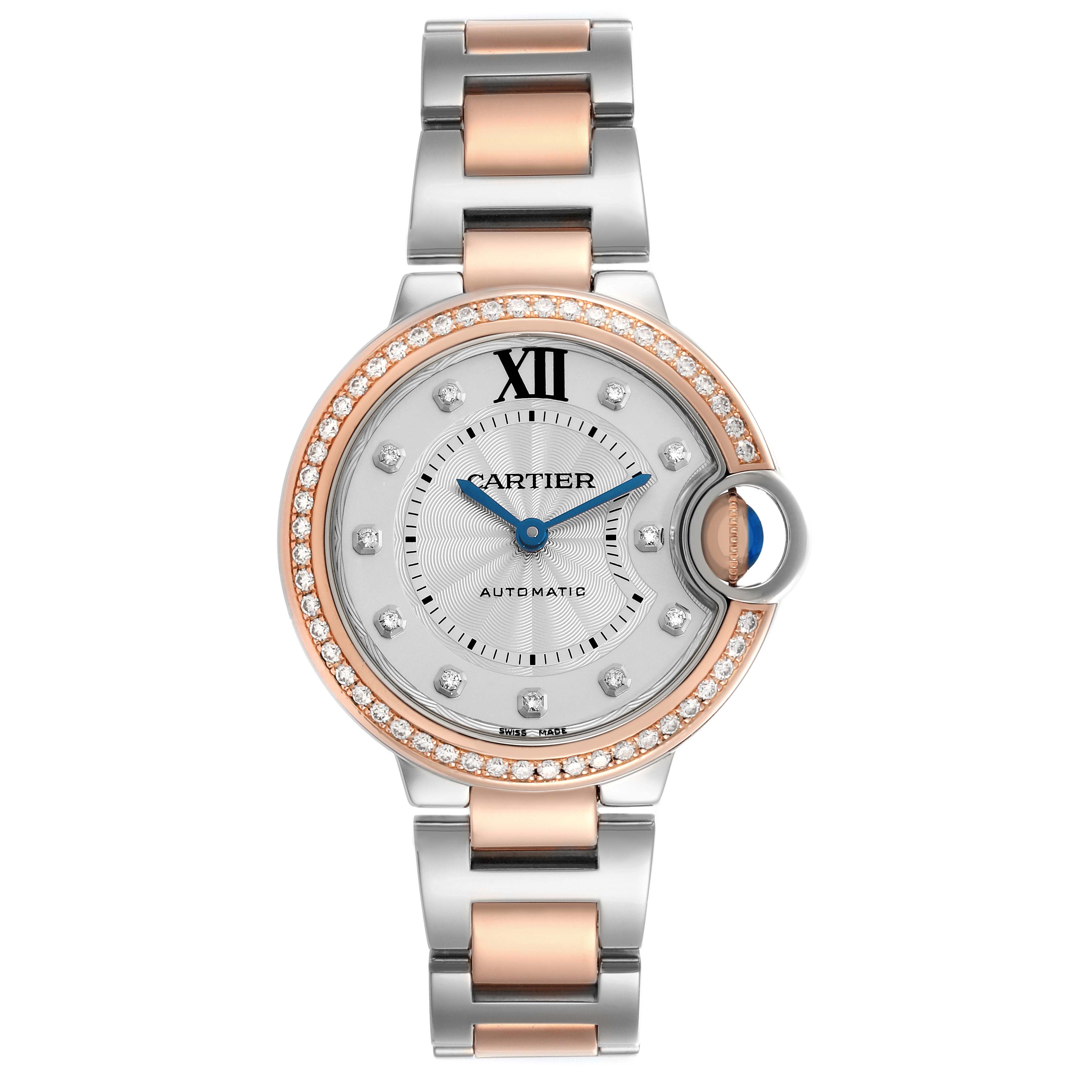 The Cartier Ballon Bleu WE902077 Women
s Steel and Gold (two tone) Silver Dial watch is shown from a top-down angle, highlighting its round face, diamond bezel, and two-tone bracelet.