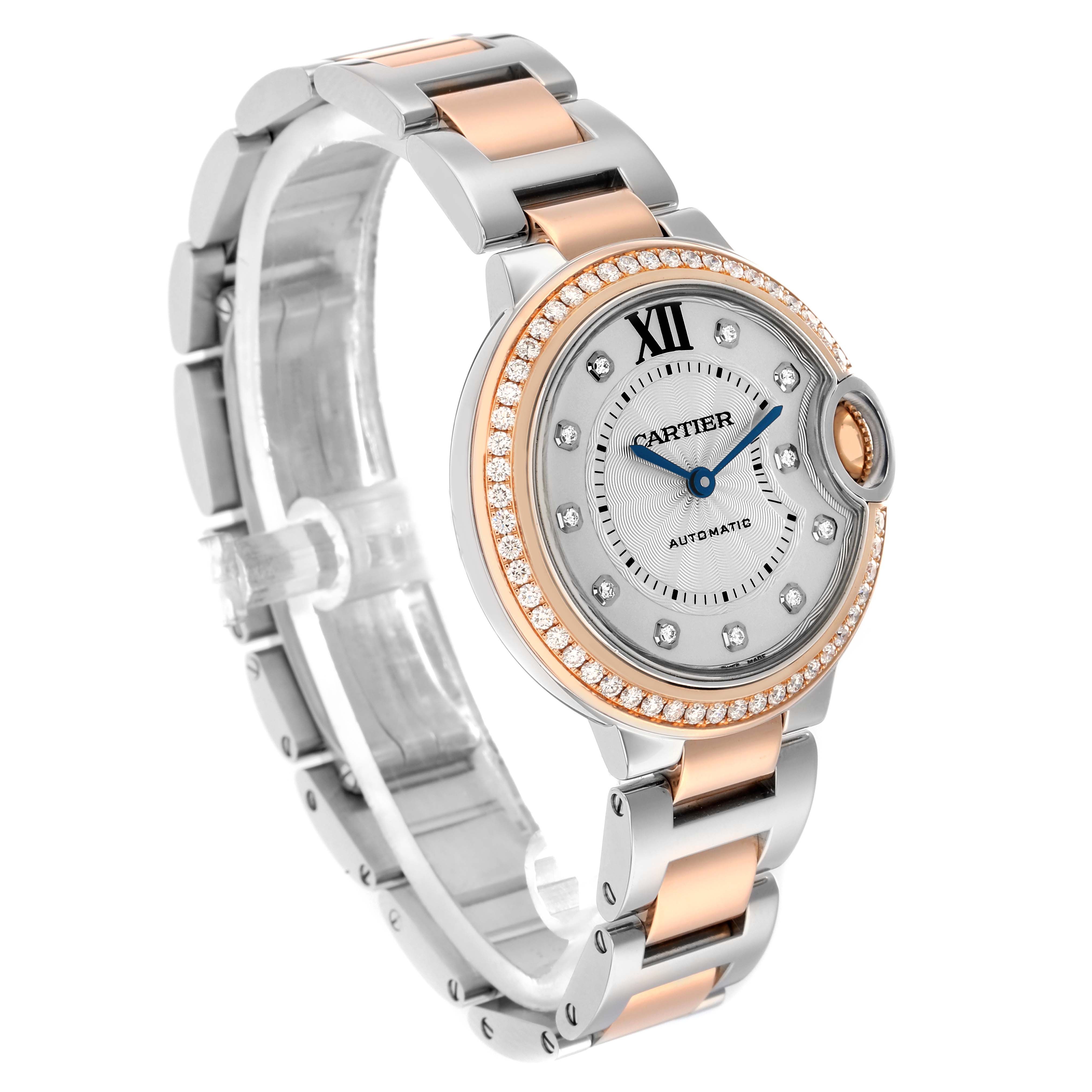 The image shows a side angle of the Cartier Ballon Bleu WE902077 Women
s Steel and Gold (two tone) Silver Dial watch, featuring its bracelet and bezel with diamond details.