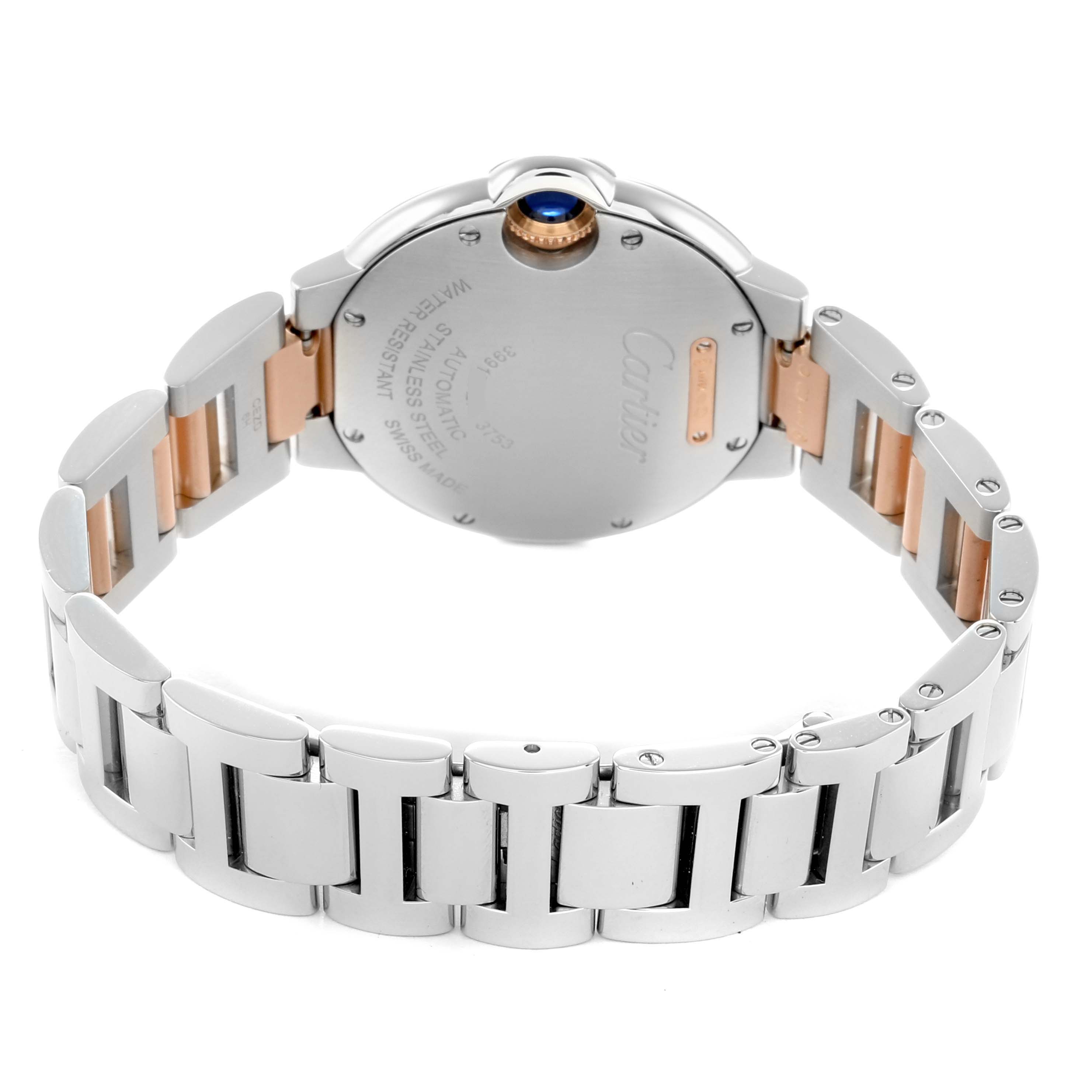 The image shows the back and bracelet of a Cartier Ballon Bleu WE902077 Women
s Steel and Gold (two tone) Silver Dial watch, displaying its stainless steel and rose gold detailing.