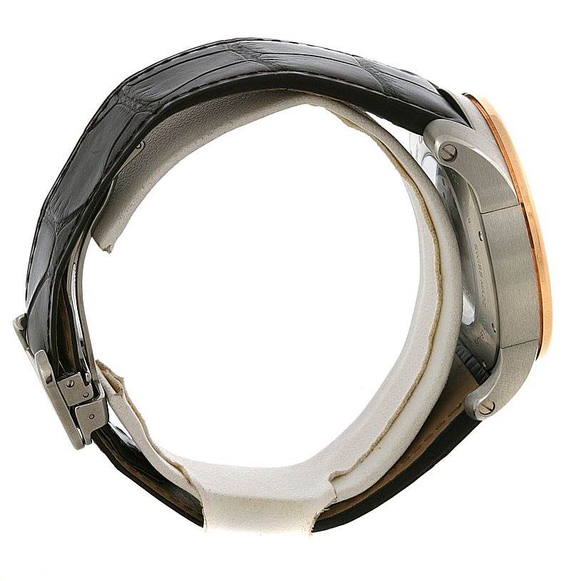 The image shows a side view of a Calibre de Cartier watch by Cartier, highlighting its clasp, case, and band.