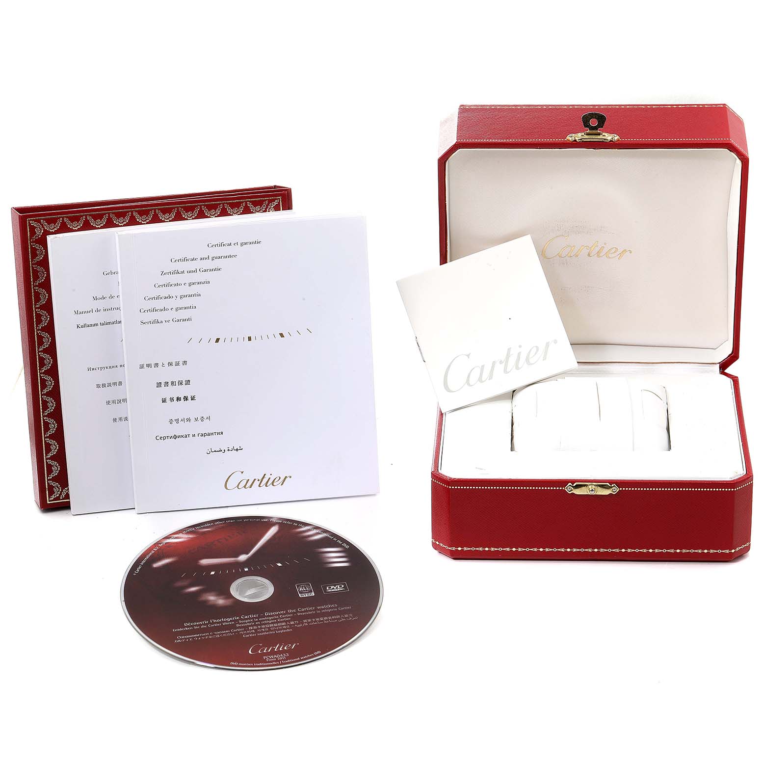 This image shows the packaging, a box, a manual, warranty papers, and a CD for a Calibre de Cartier watch by Cartier.