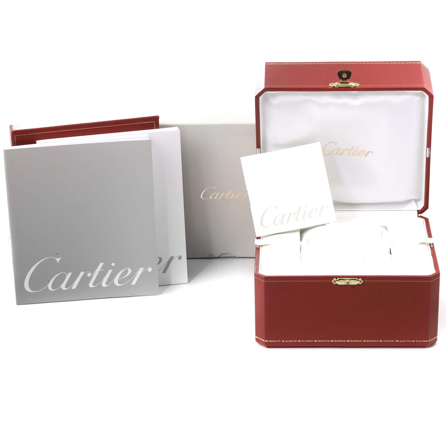 The image shows the packaging and booklets for a Cartier Roadster W62019X6 Men
s Stainless Steel Silver Dial W62019X6 Men
s Stainless Steel Silver Dial watch, including the branded box and manuals.