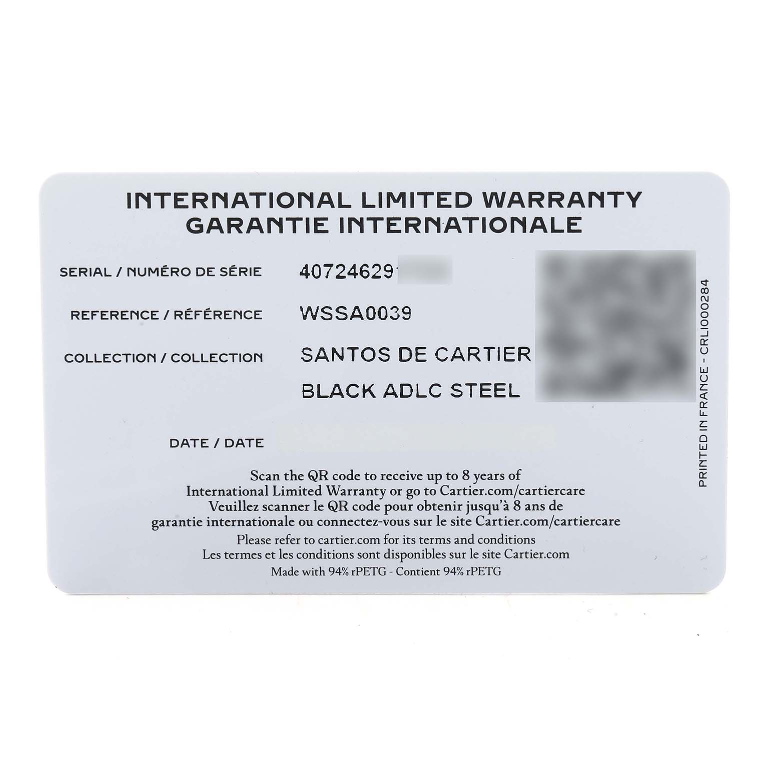 This image shows the international limited warranty card for the Santos de Cartier watch, detailing model and material information.