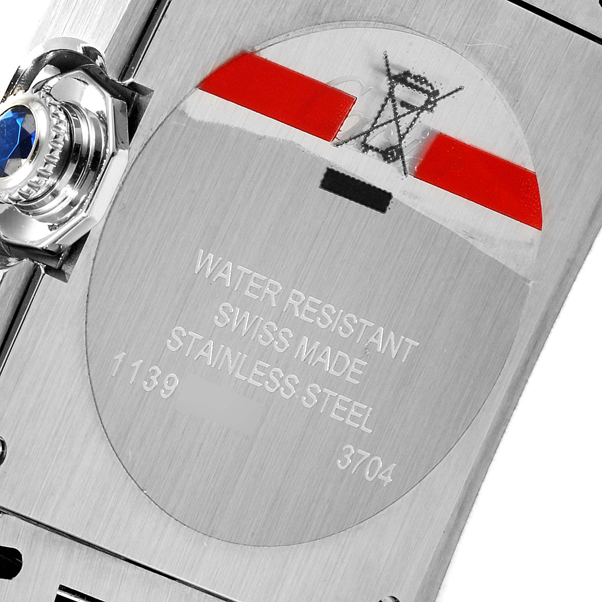 The image shows the back of a Cartier Tank Anglaise W4TA0004 Women's Stainless Steel Silver Dial W4TA0004 Women's Stainless Steel Silver Dial watch, highlighting the stainless steel case and water resistance details.