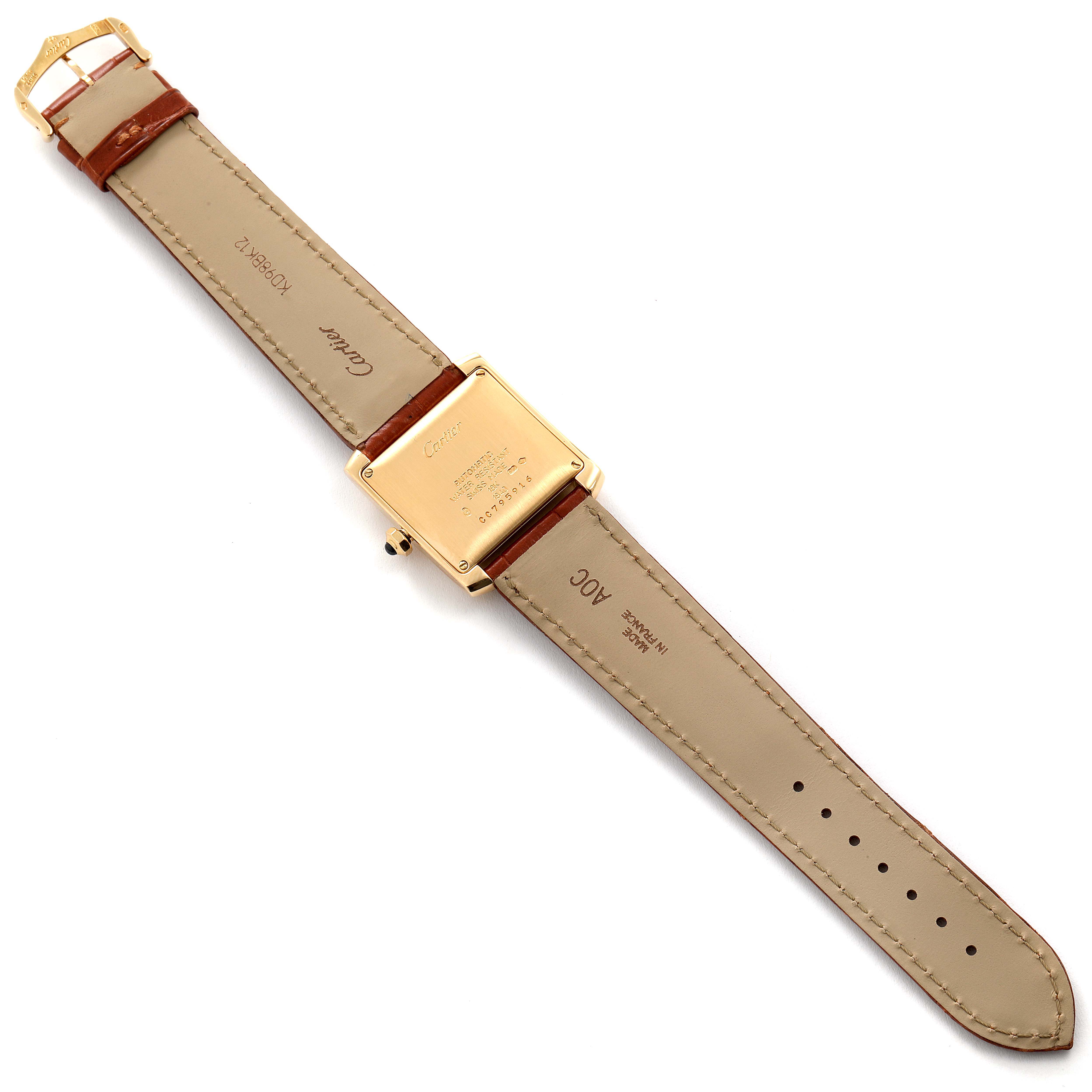 The image shows the back view of a Cartier Tank Francaise W5000156 Men's Yellow Gold Silver Dial W5000156 Men's Yellow Gold Silver Dial watch, highlighting its strap, buckle, and caseback.