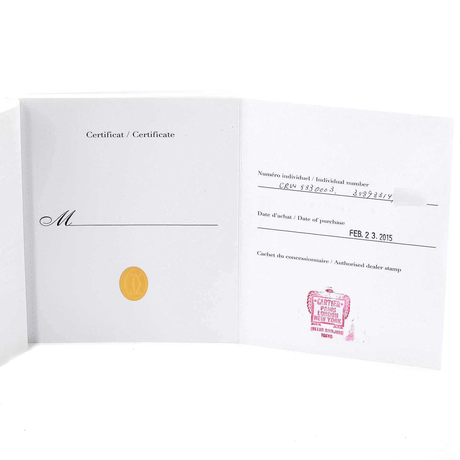 The image shows an open warranty certificate for the Cartier Tank MC W5330003 Men's Stainless Steel Silver Dial W5330003 Men's Stainless Steel Silver Dial watch, displaying the purchase date and dealer stamp.