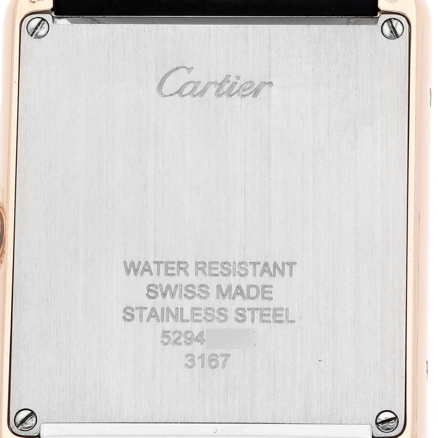 The image shows the back of a Cartier Tank Solo W5200025 Men
s Steel and Gold (two tone) Silver Dial watch, highlighting the brand engraving and specifications.