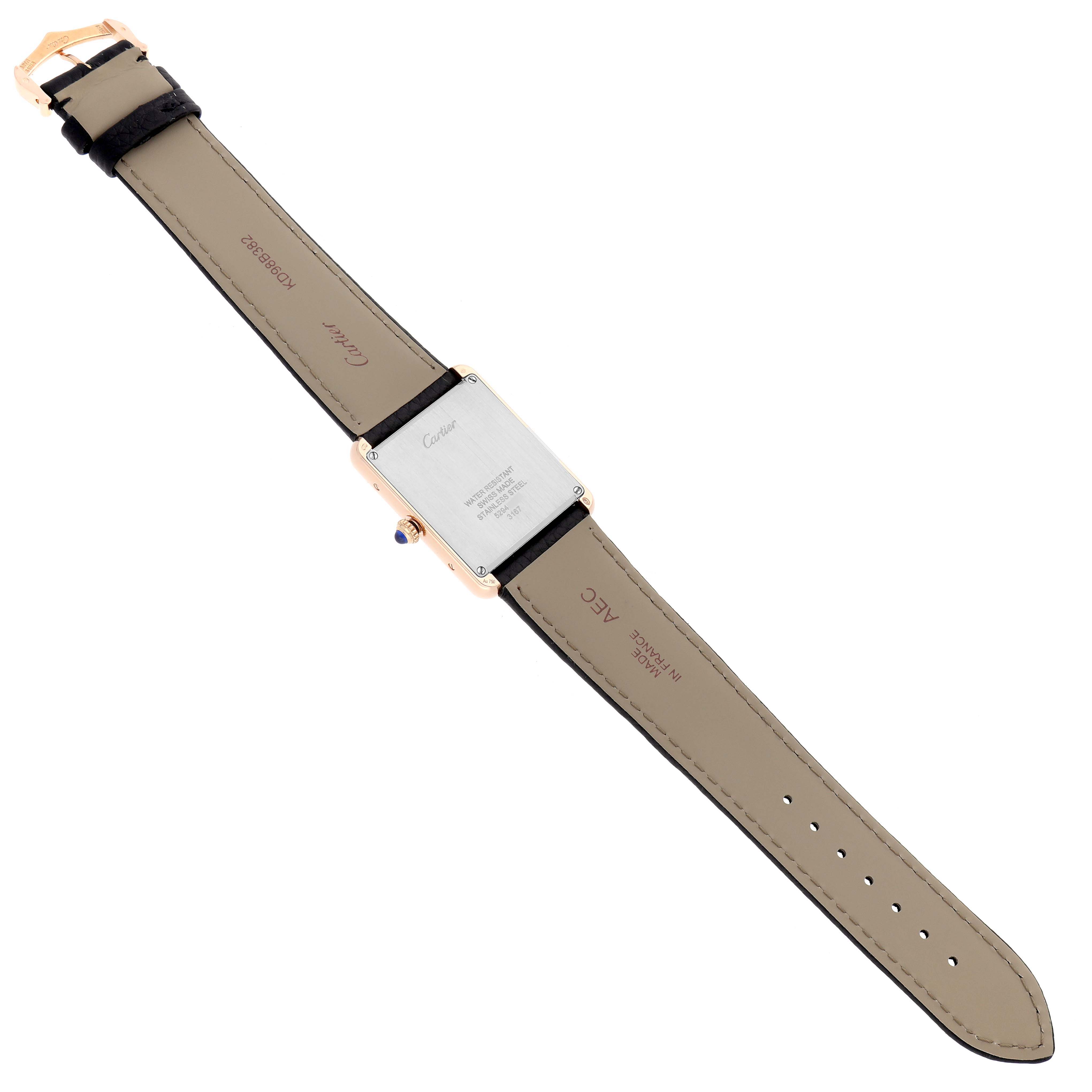 The Cartier Tank Solo W5200025 Men
s Steel and Gold (two tone) Silver Dial watch is shown from the back, highlighting the case, strap, and buckle.